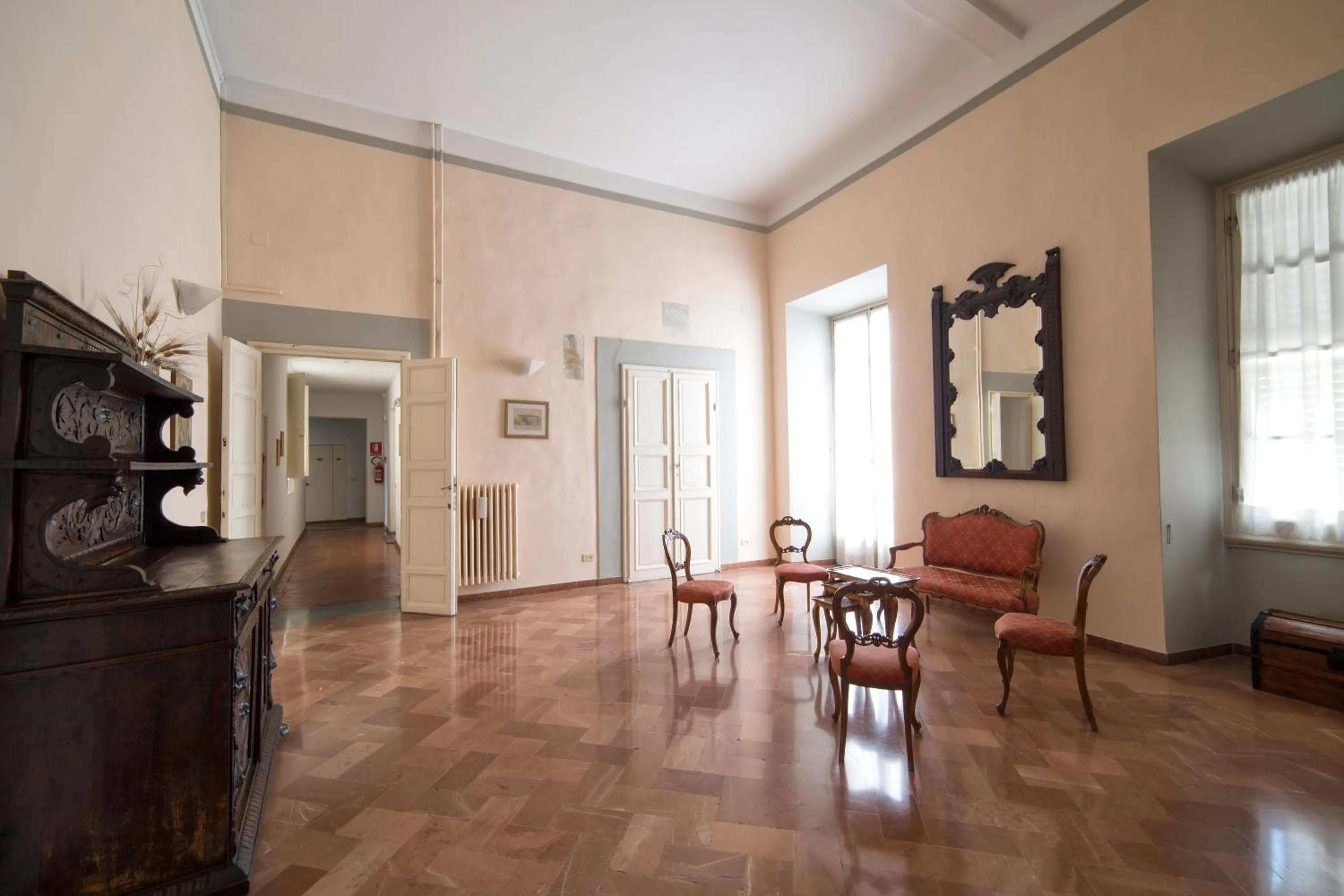 Communal lounge/ TV room in Casa Santo Nome di Gesu