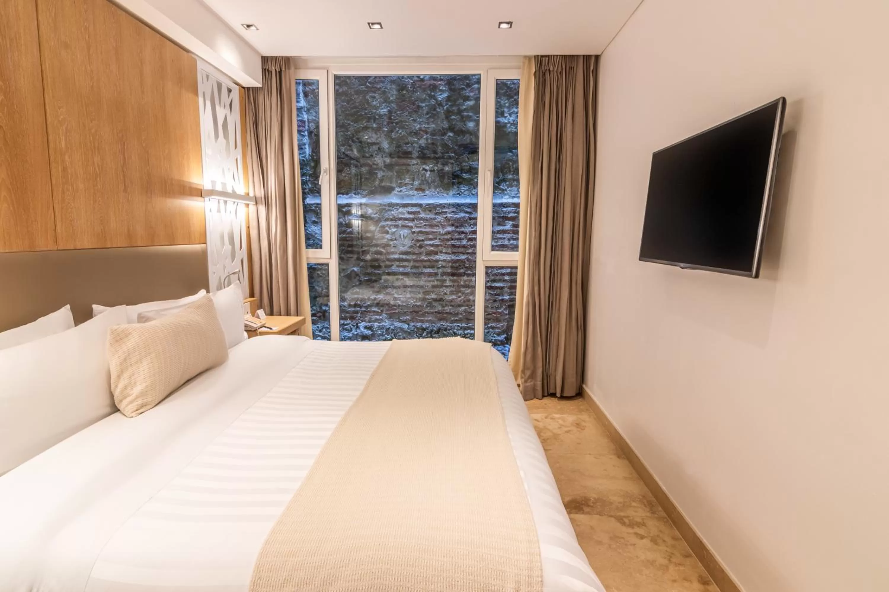 Bed in GHL Arsenal Hotel