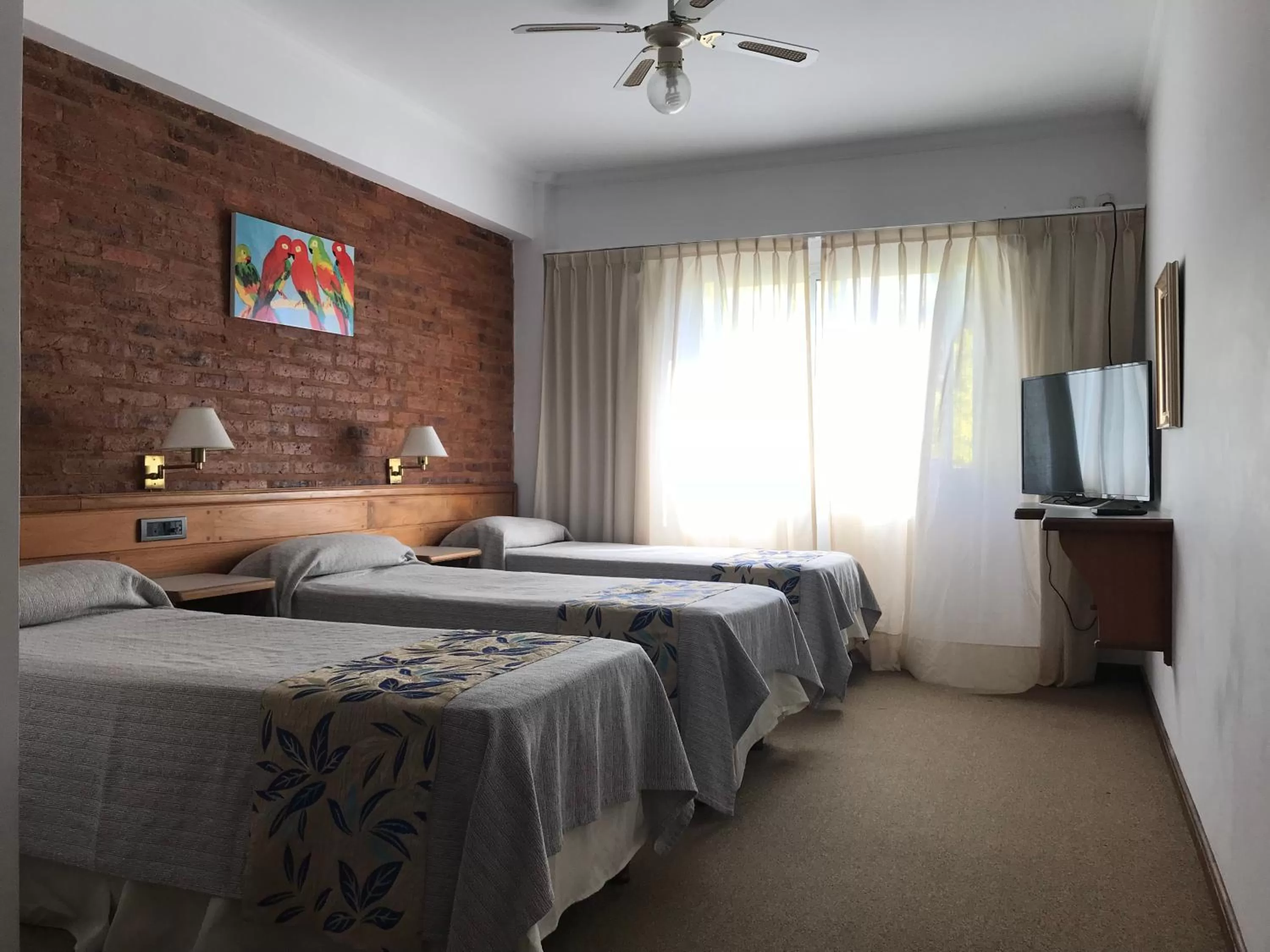 Bed in Costanera Mar Hotel & Suites