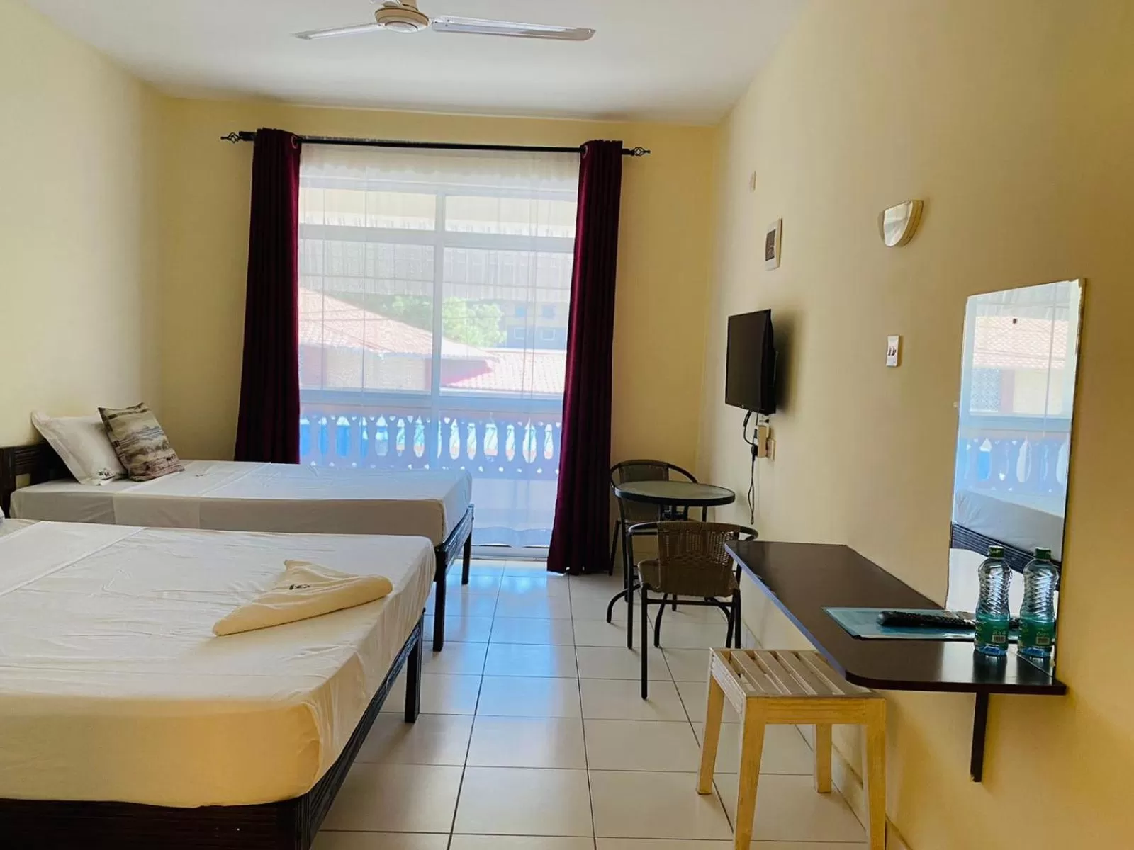 Bed in Merry Villa Hotel & Apartments