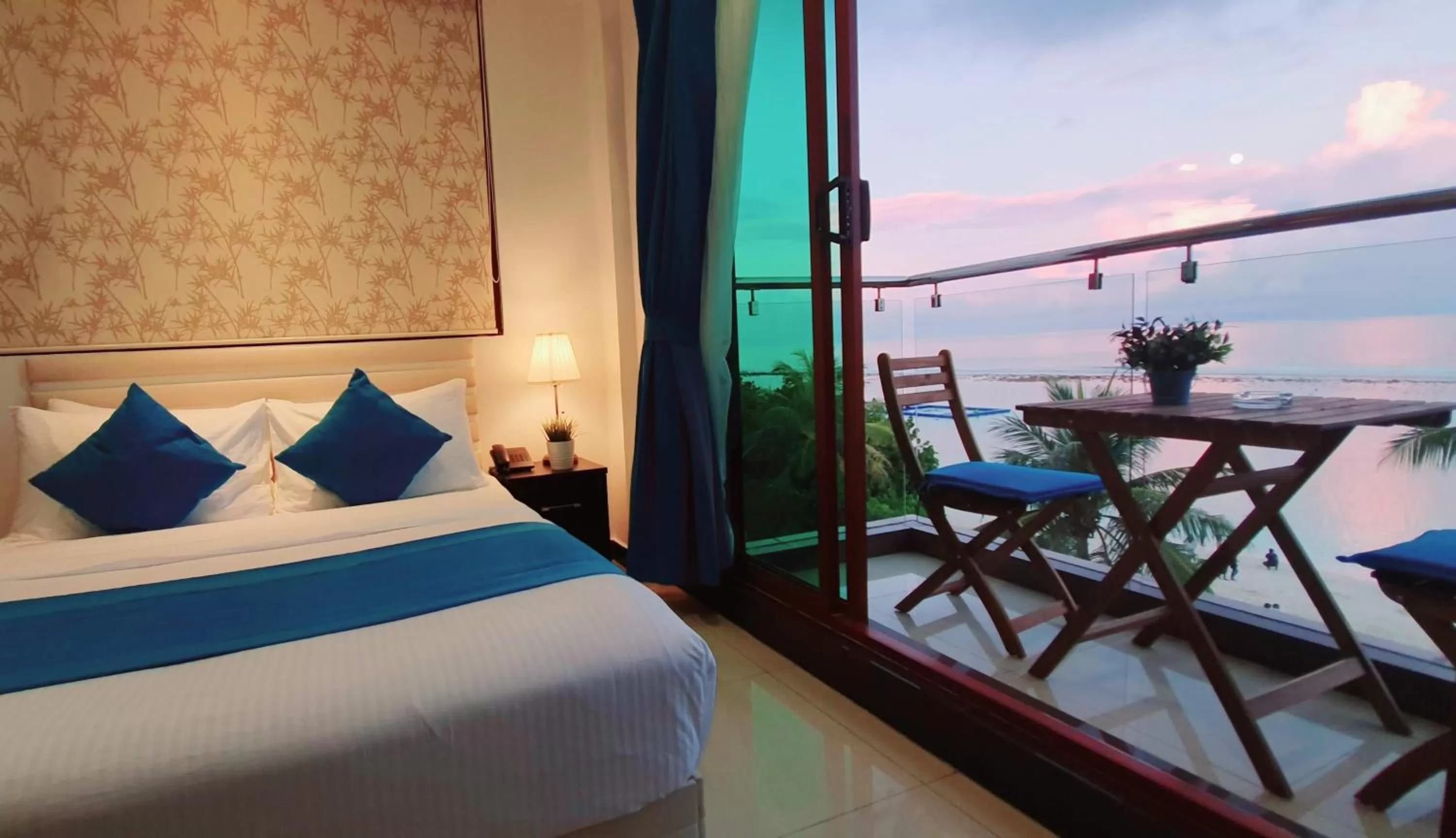 Balcony/Terrace, Bed in Huvan Beach Hotel at Hulhumale