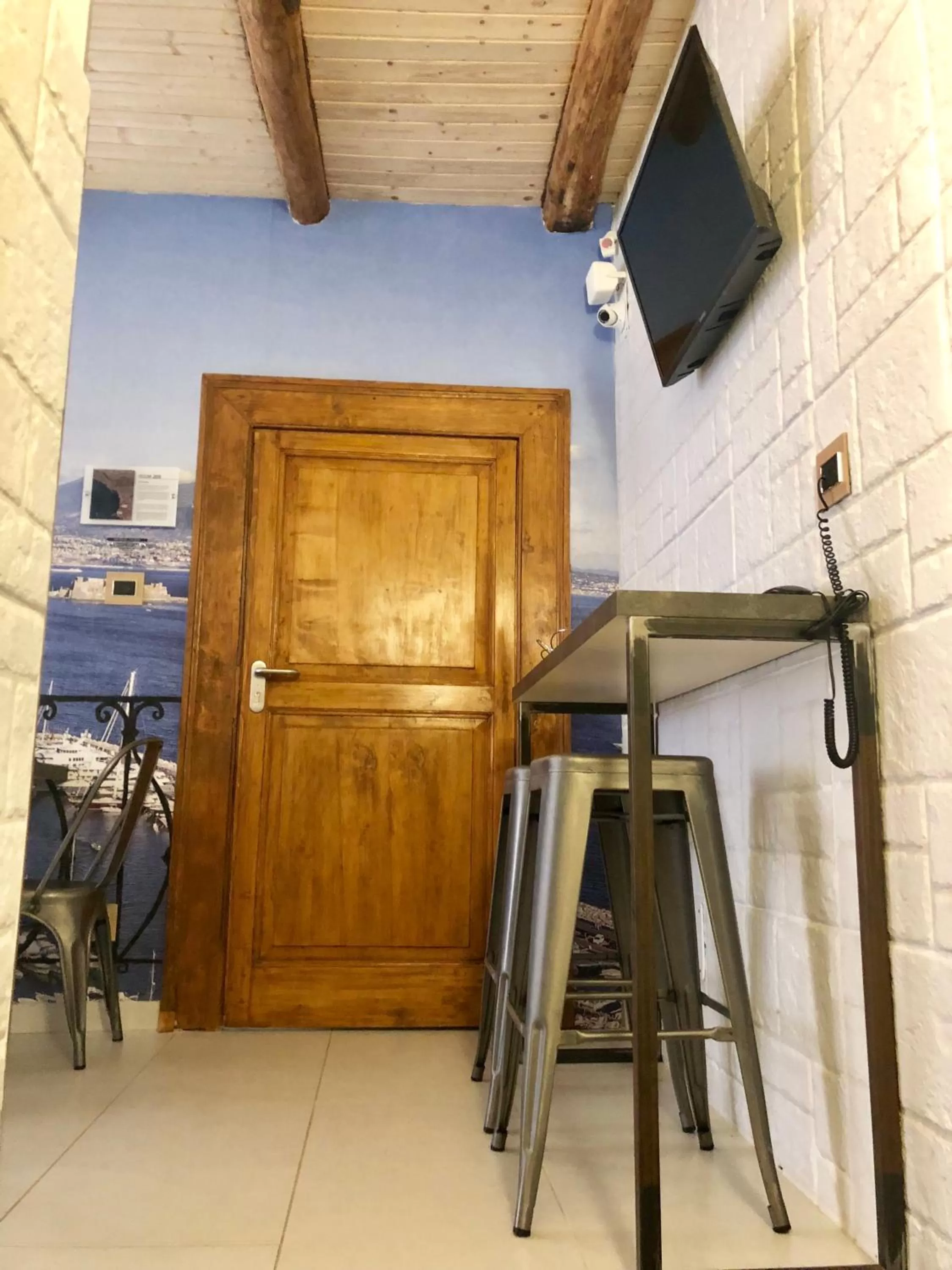 Communal lounge/ TV room in Relais Piazza Del Plebiscito B&B