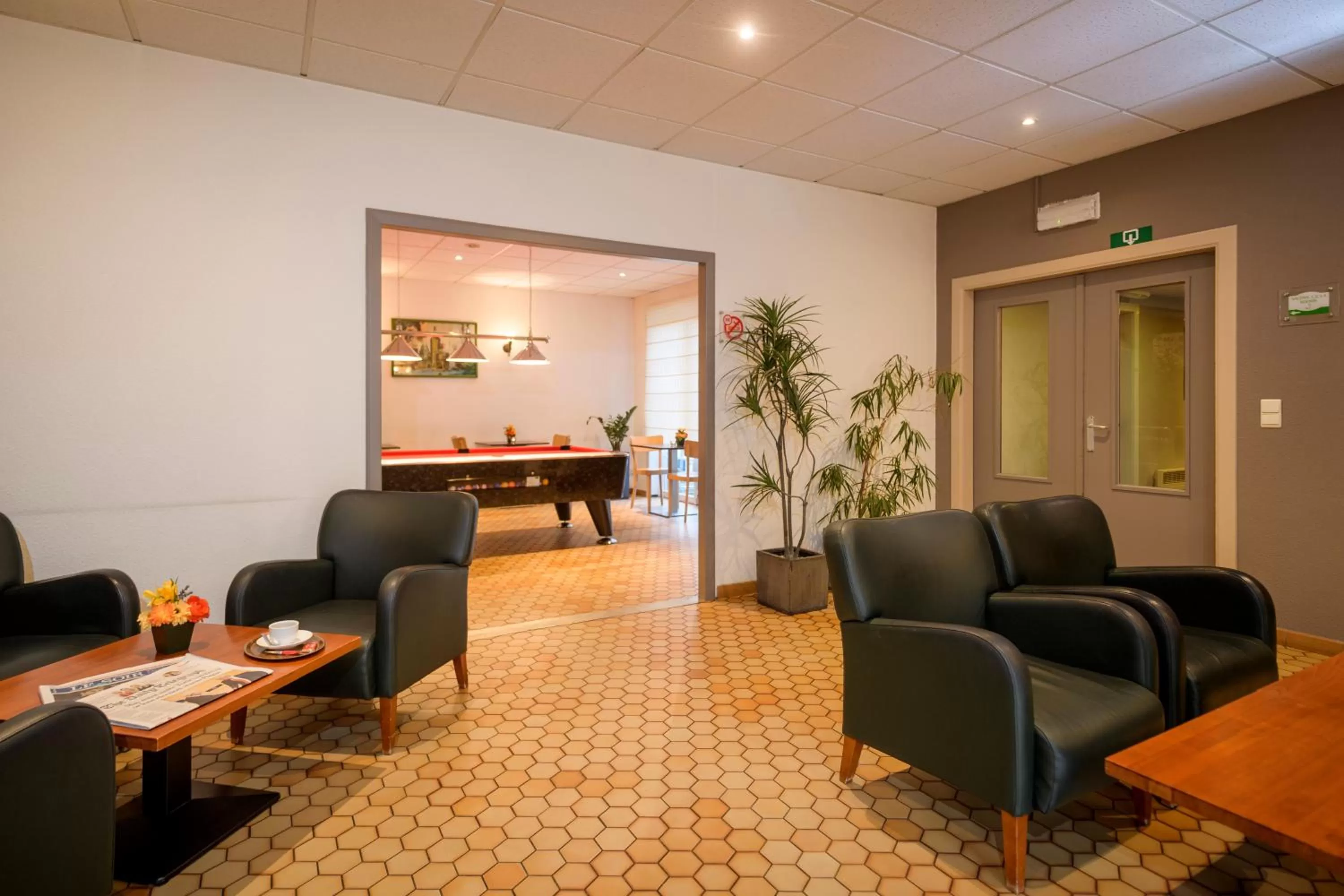 Communal lounge/ TV room in Campanile Hotel & Restaurant Brussels Vilvoorde