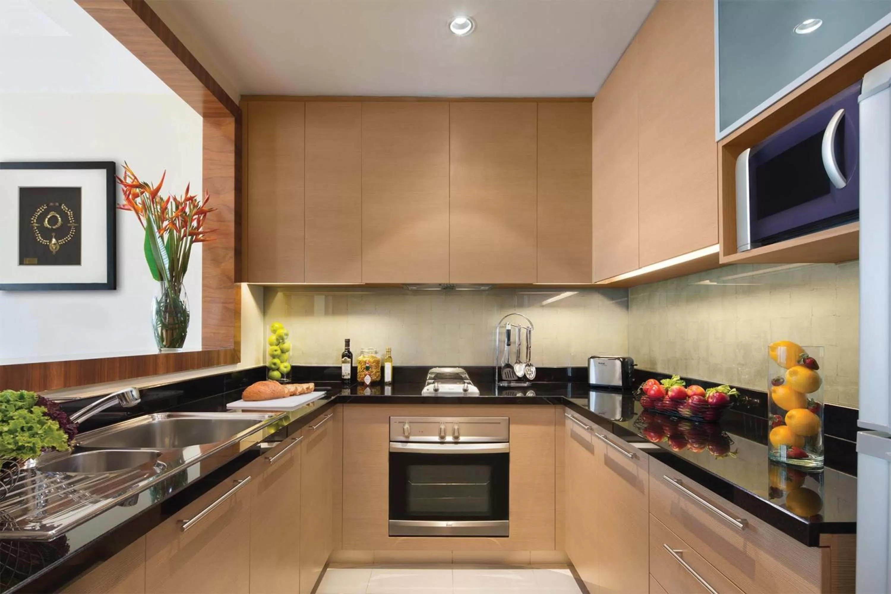 Kitchen or kitchenette in Oakwood Premier Cozmo Jakarta