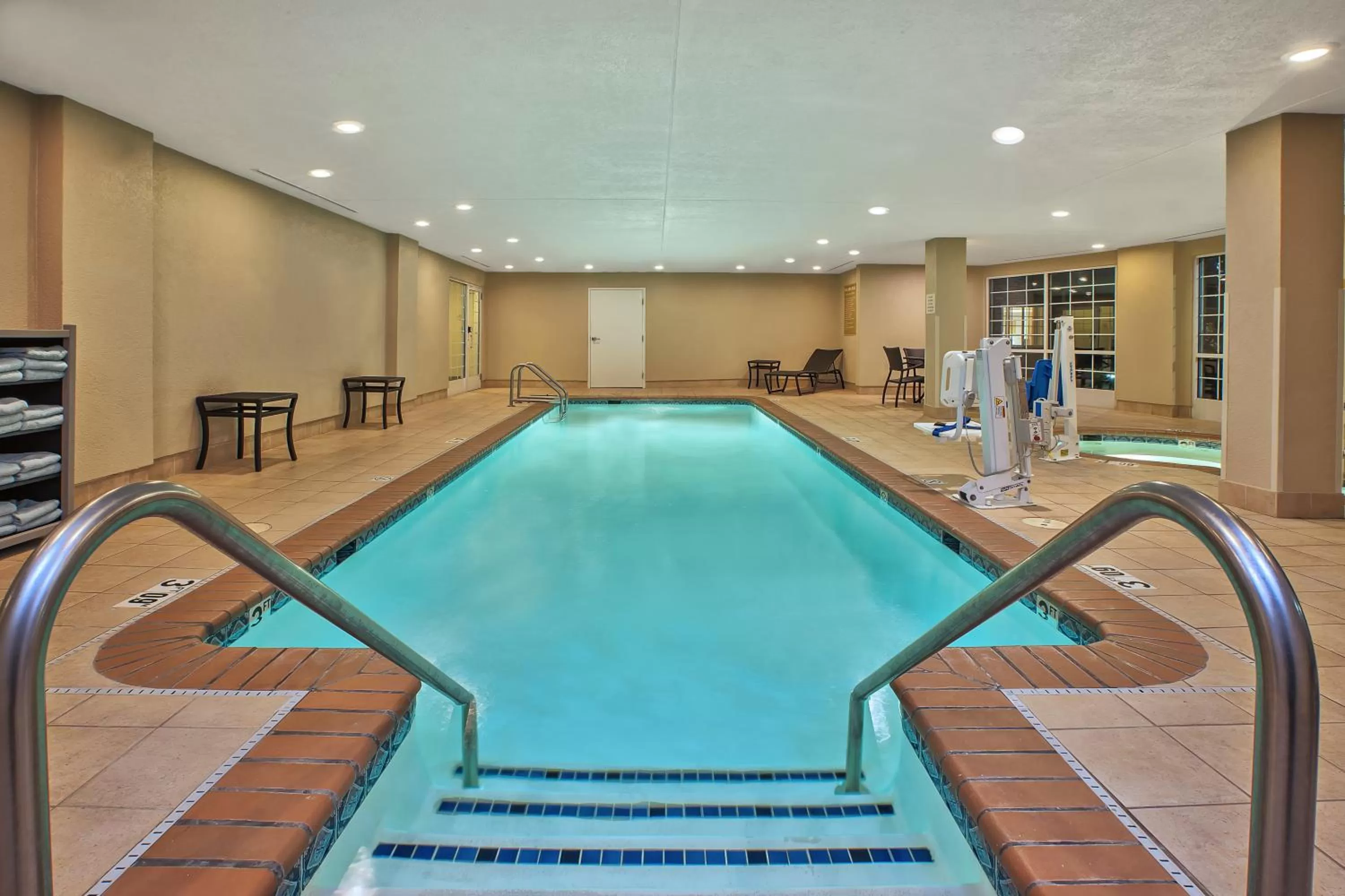 Swimming pool in Candlewood Suites Indianapolis Northeast by IHG
