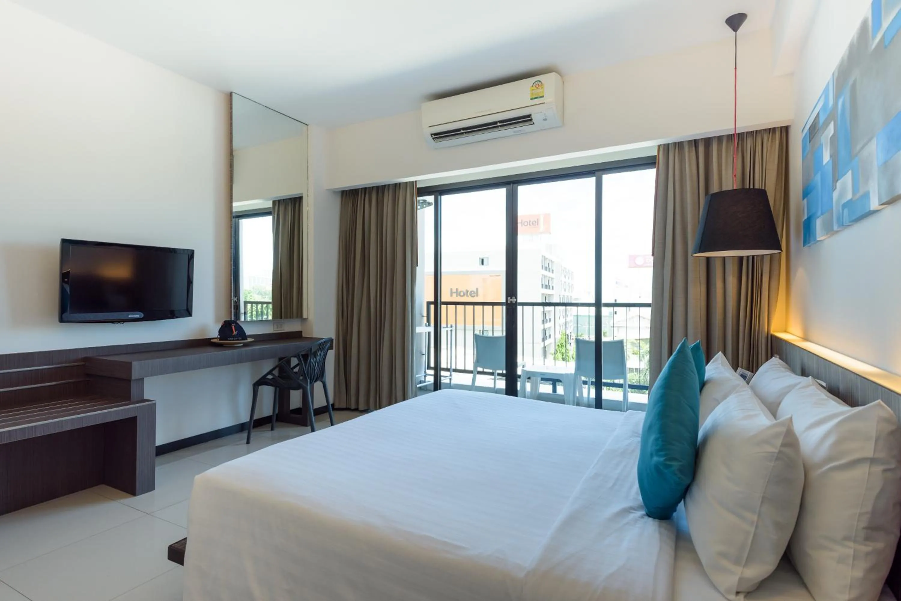 Bed in Hotel J Residence Pattaya