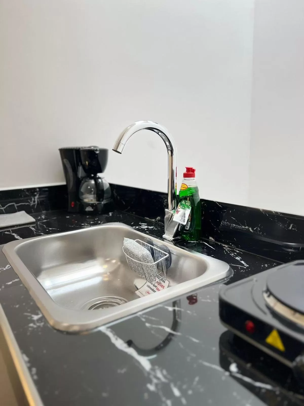 Kitchen or kitchenette in Hotel Boutique Business Center