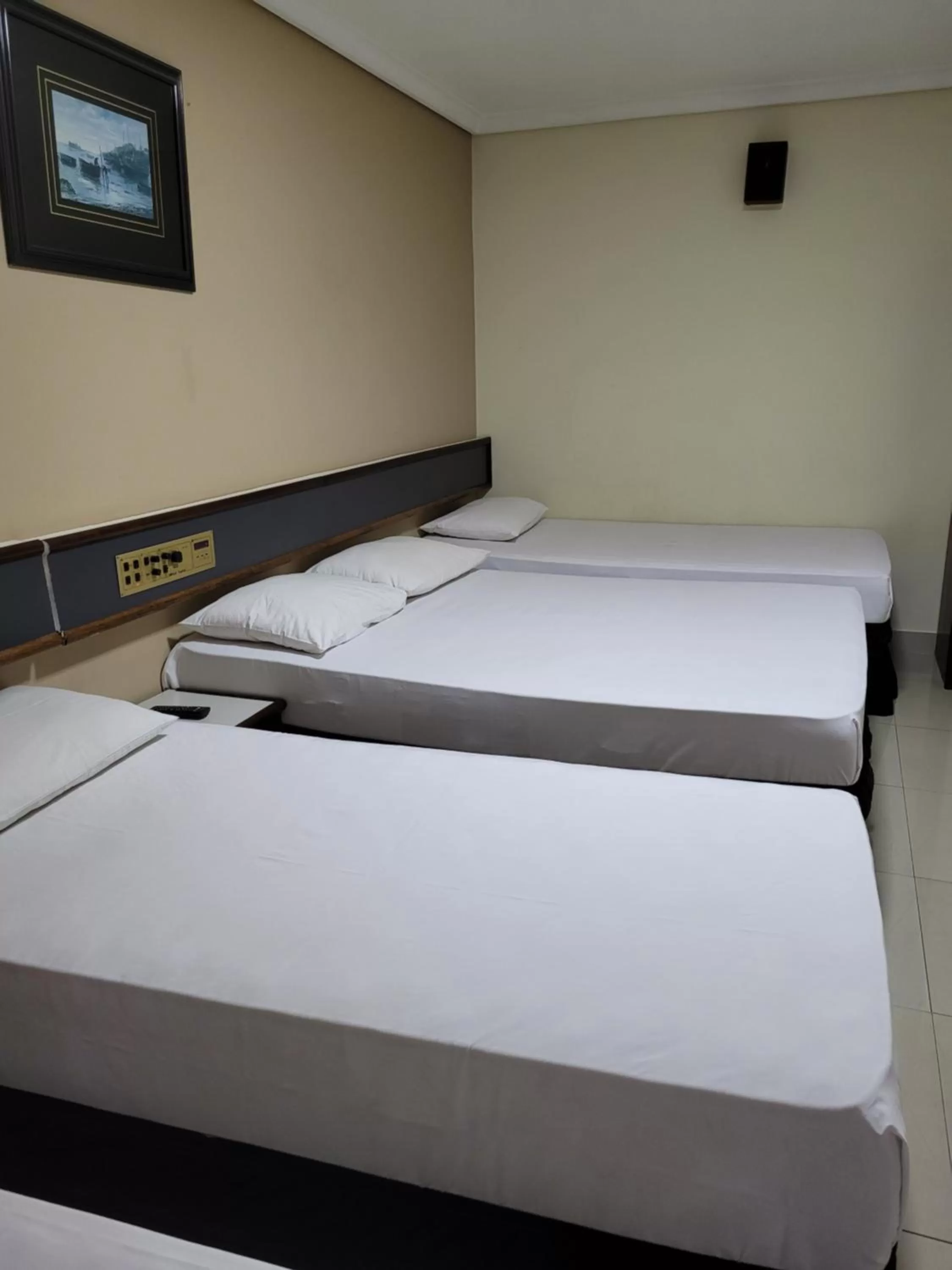 Bed in Hotel Estação Express