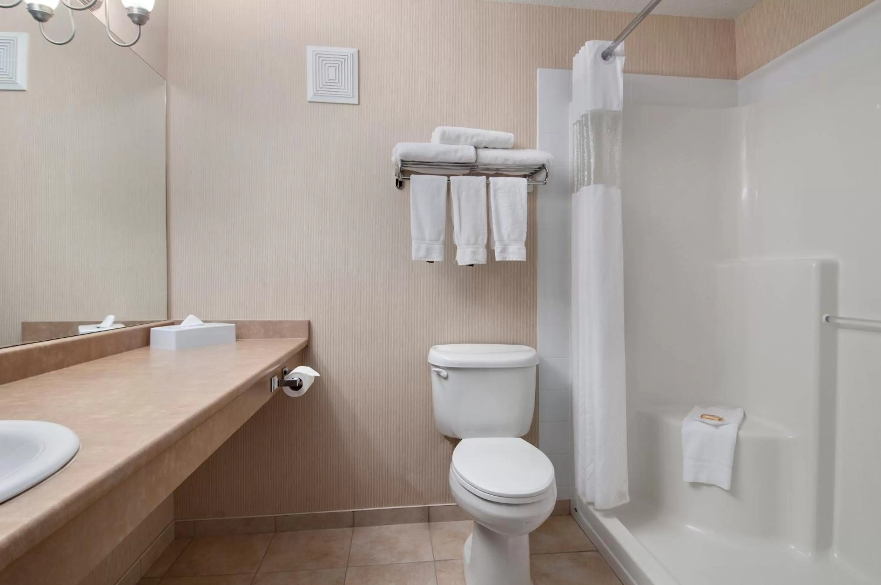 Shower in Days Inn & Suites by Wyndham Cochrane