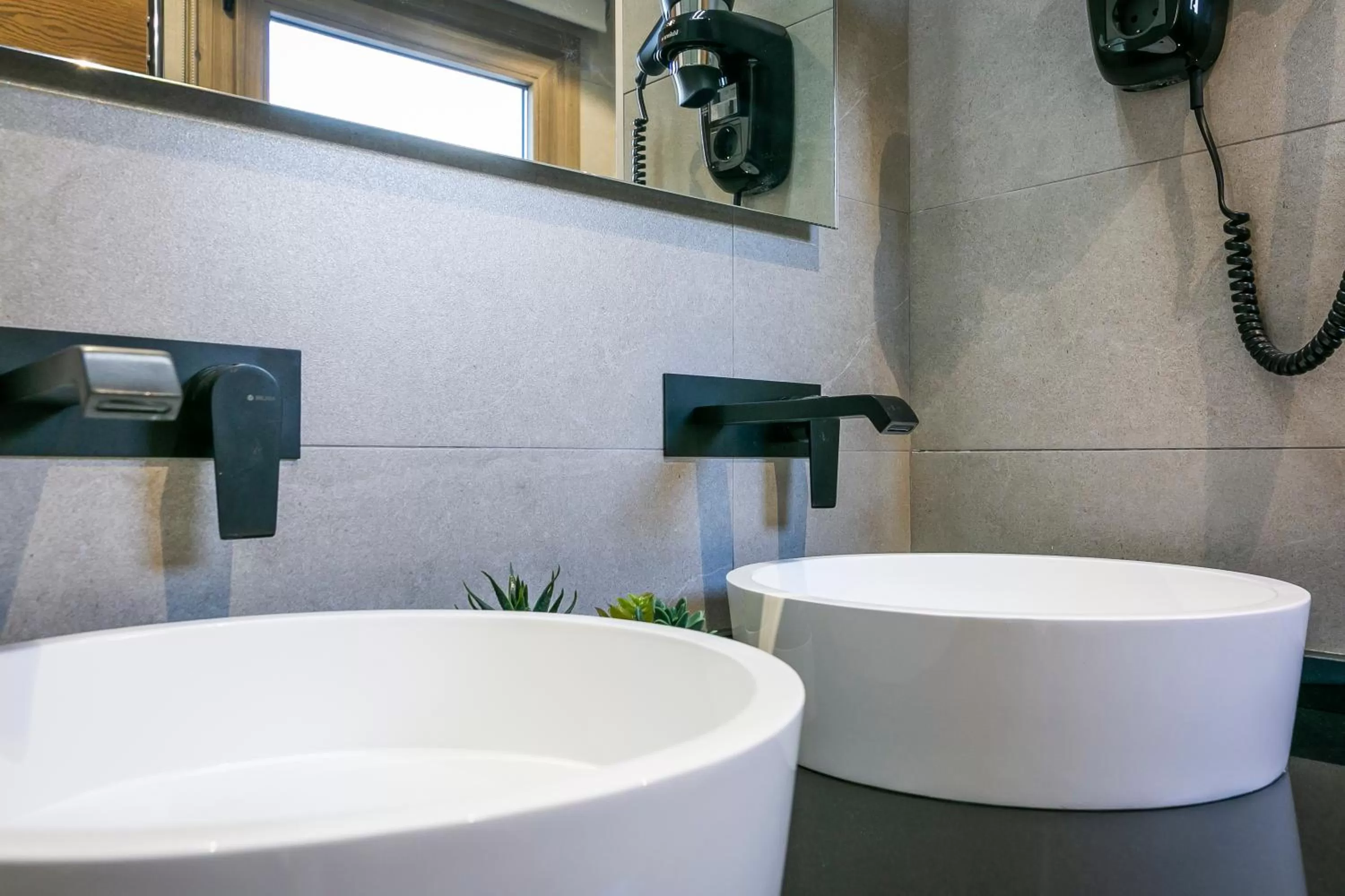 Bathroom in Aquitania Home Suites