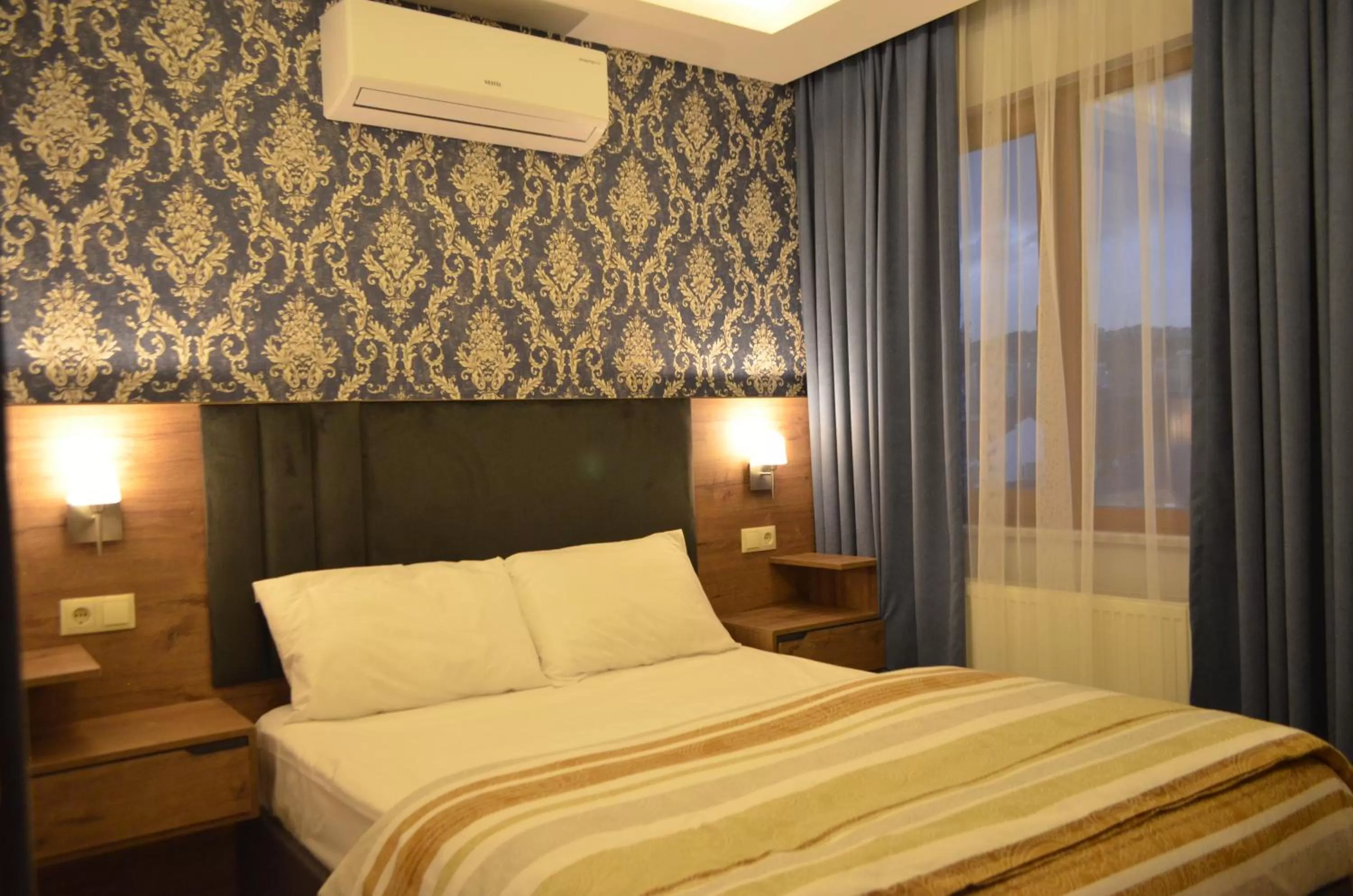 Bed in Yılmaz Suit Apartments