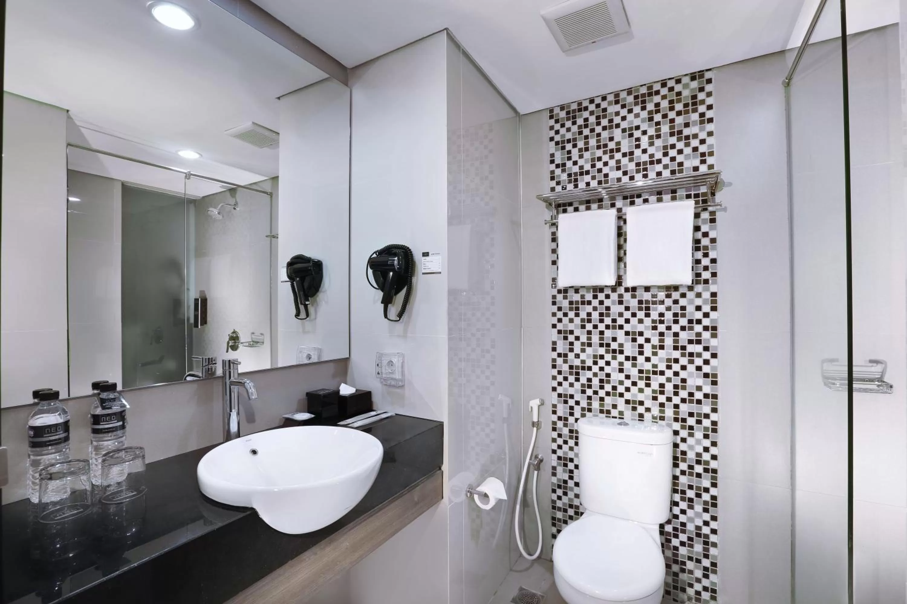 Bathroom in Hotel Neo Malioboro by ASTON