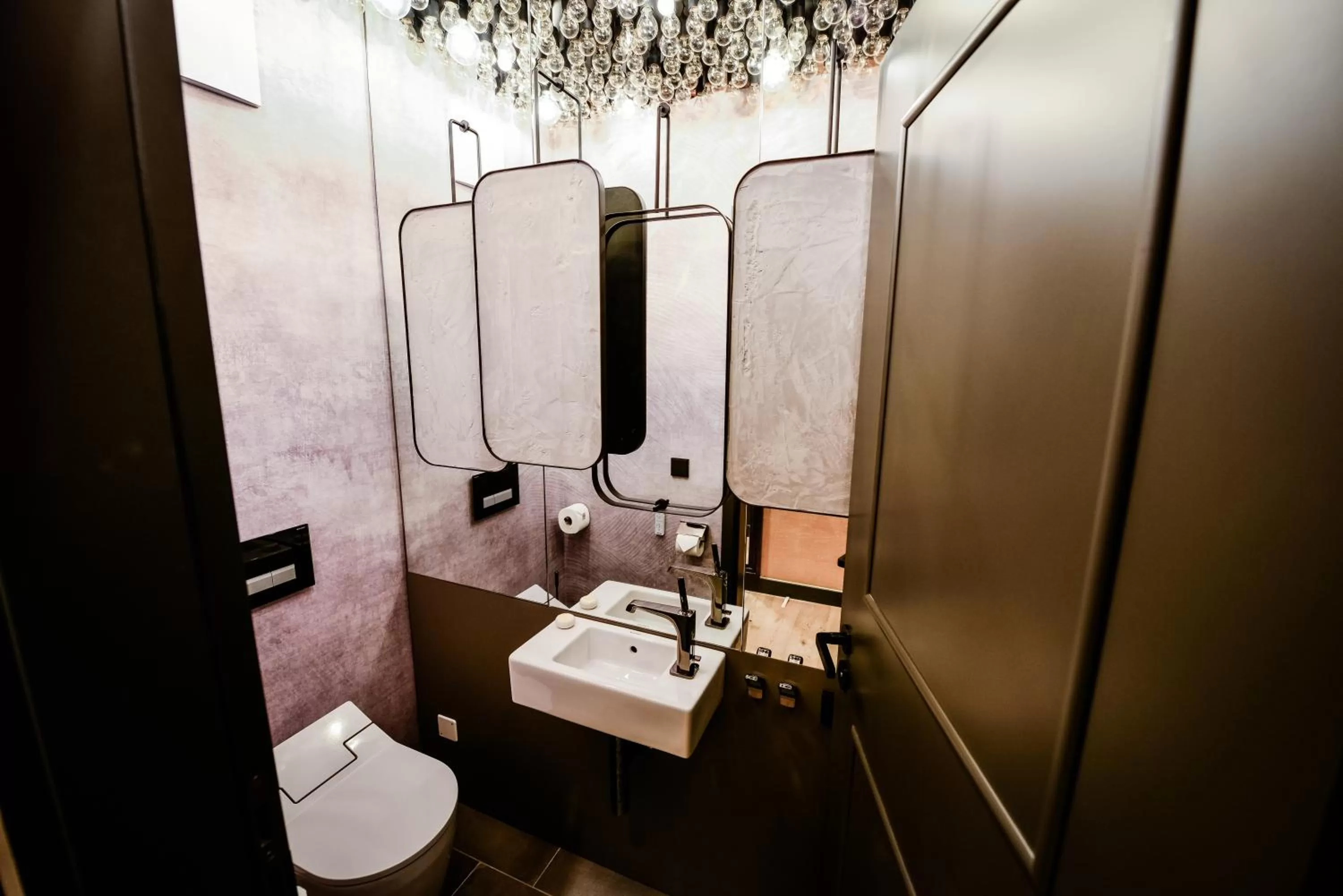 Toilet in Hotel Liberty Offenburg