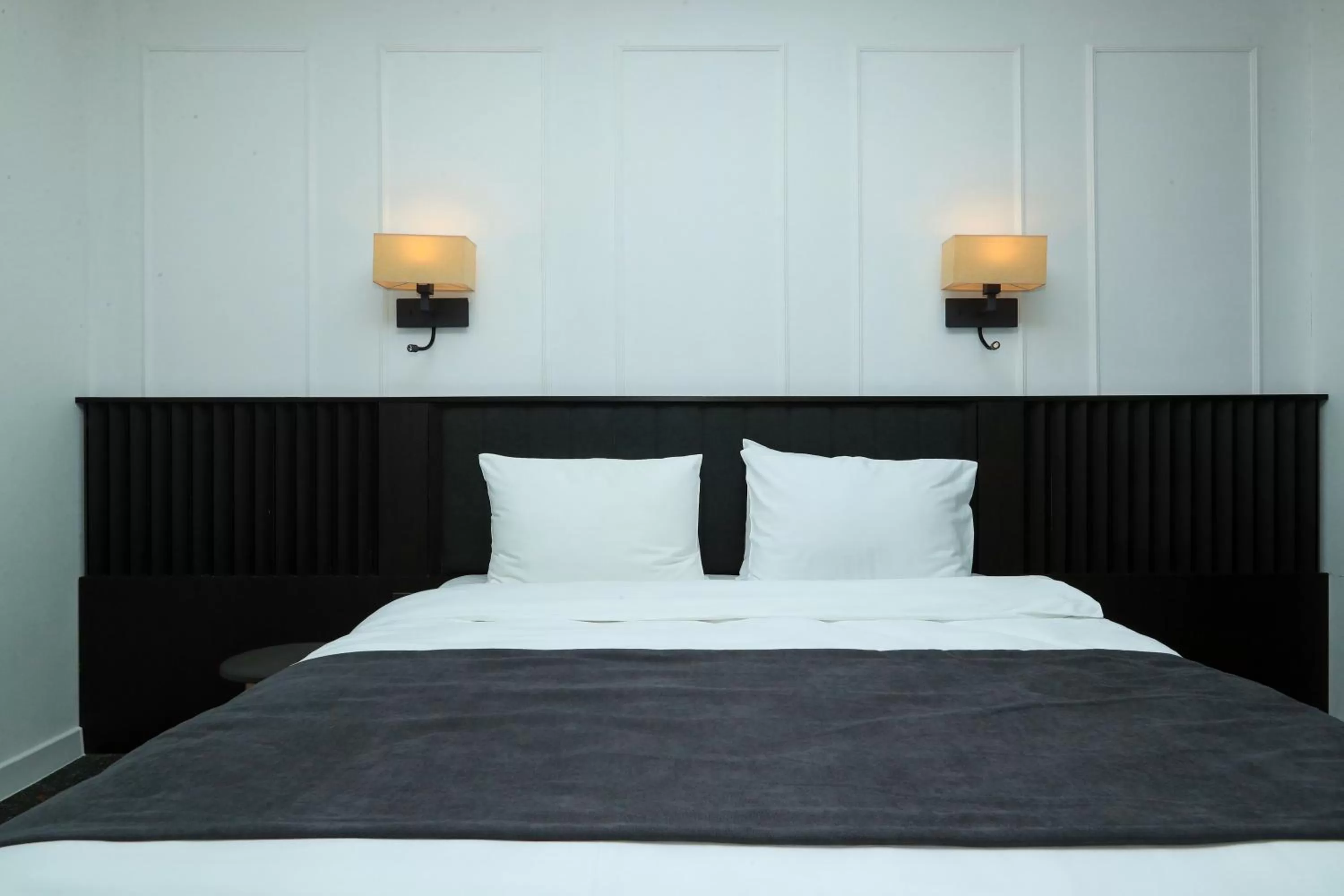 Bed in Pine Astoria Hotel