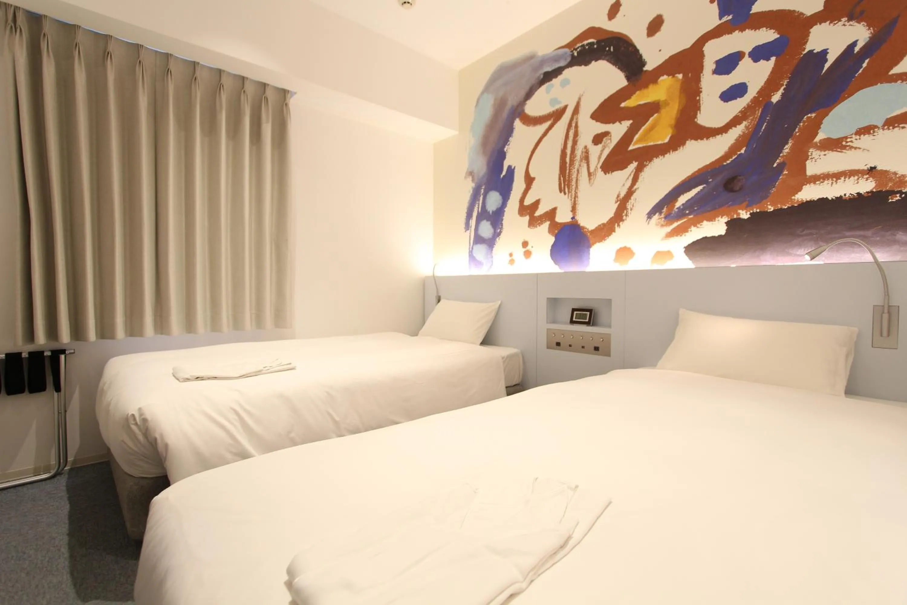 Bed in KOKO HOTEL Osaka Namba Ebisucho