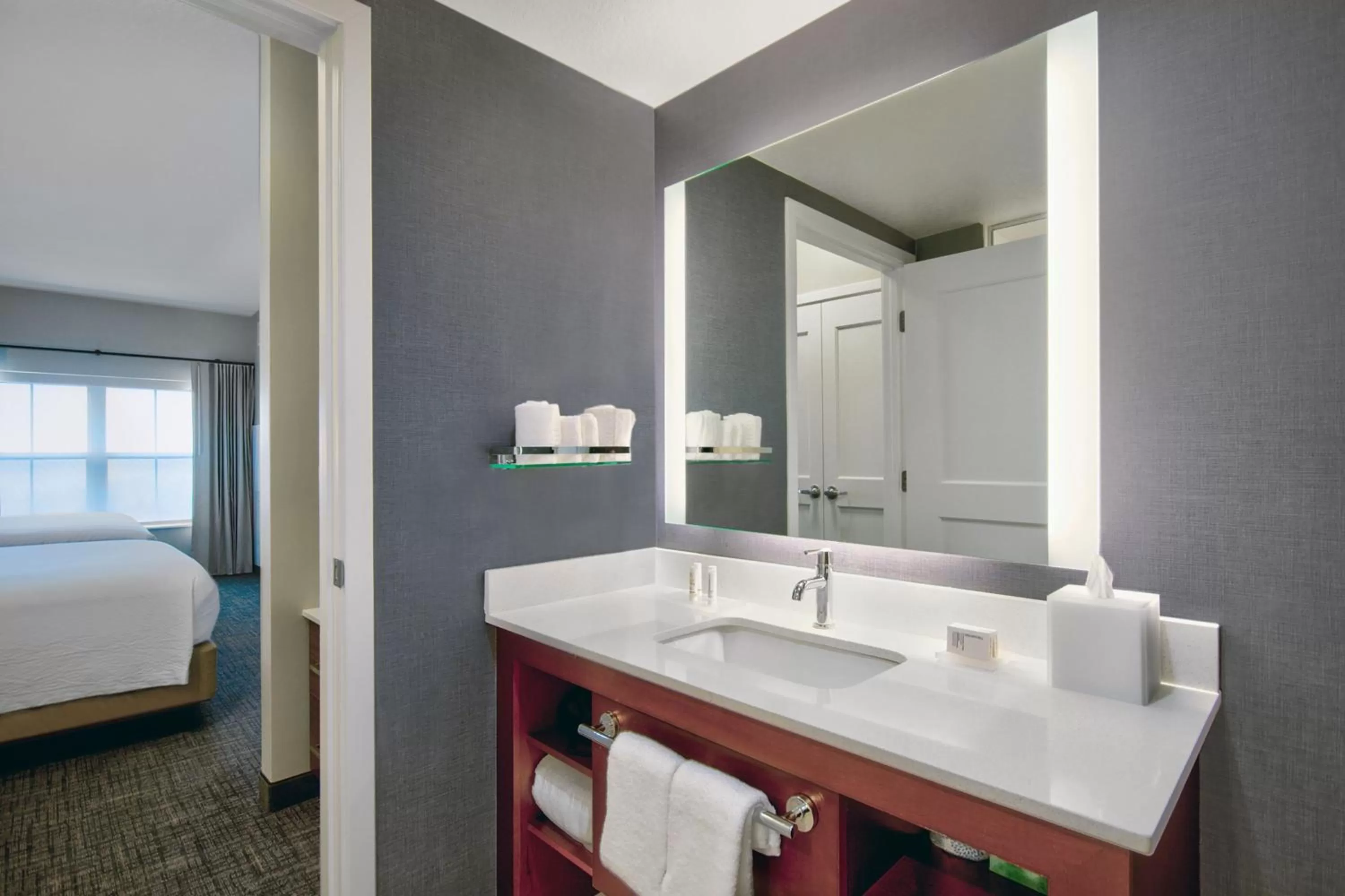 Bathroom, Bed in Residence Inn by Marriott Orlando at FLAMINGO CROSSINGS Town Center