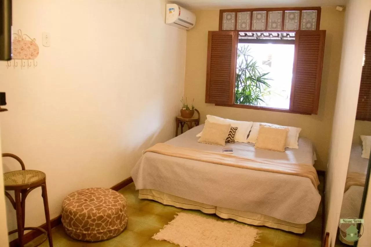 Bed in Pousada Nossa Terra