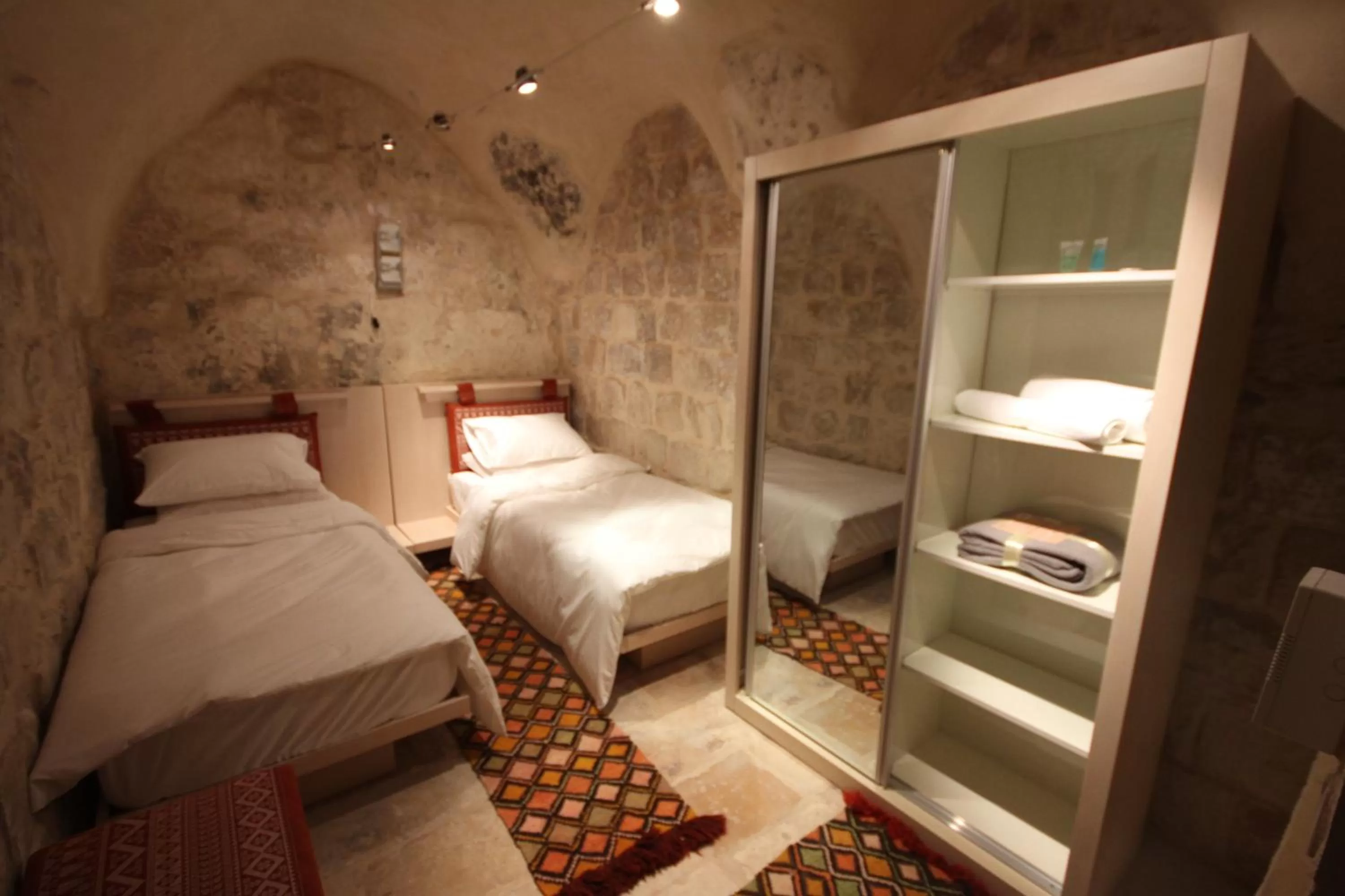 Bed in Khan Alwakala Hotel