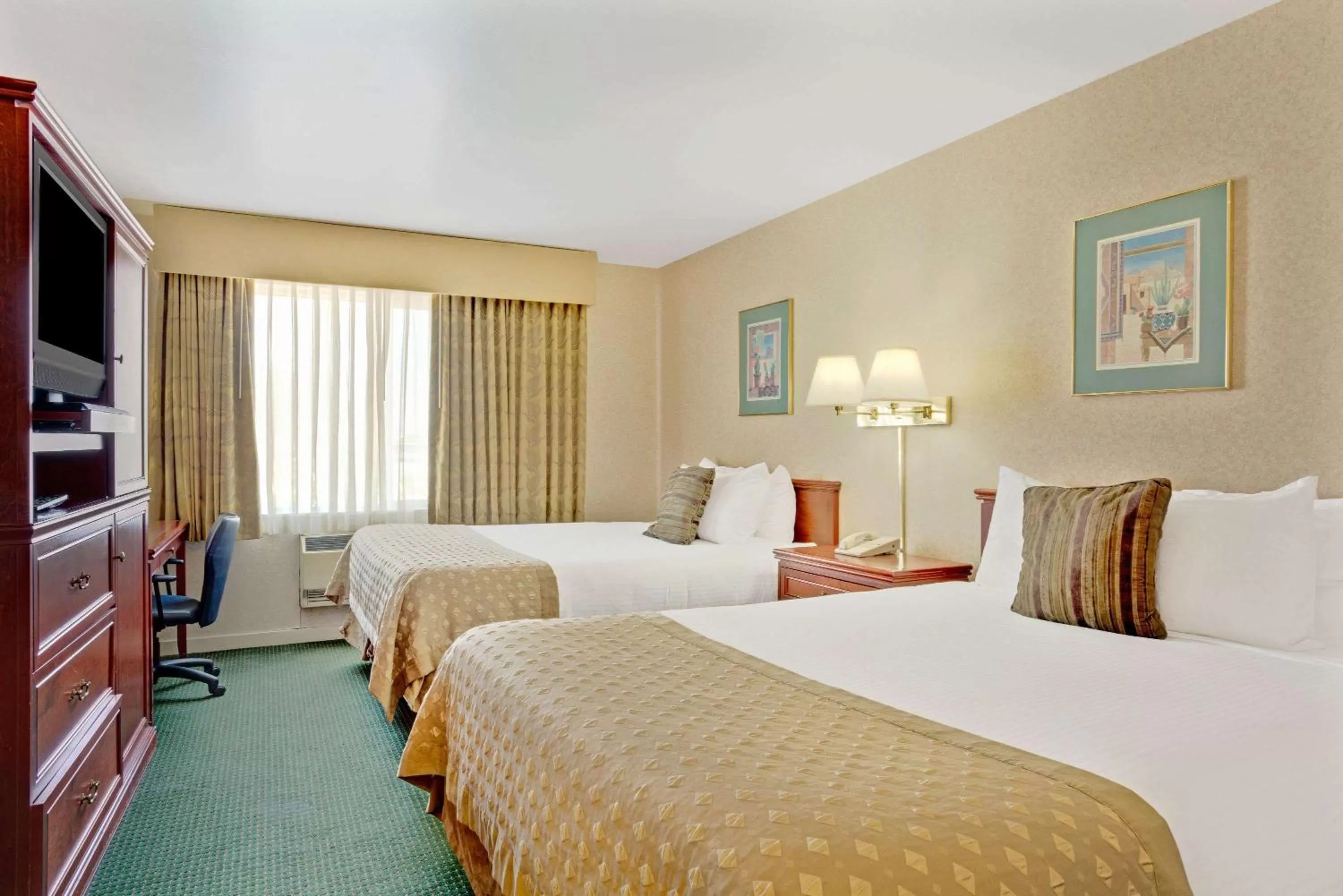 Photo of the whole room, Bed in Ramada by Wyndham Draper, Utah