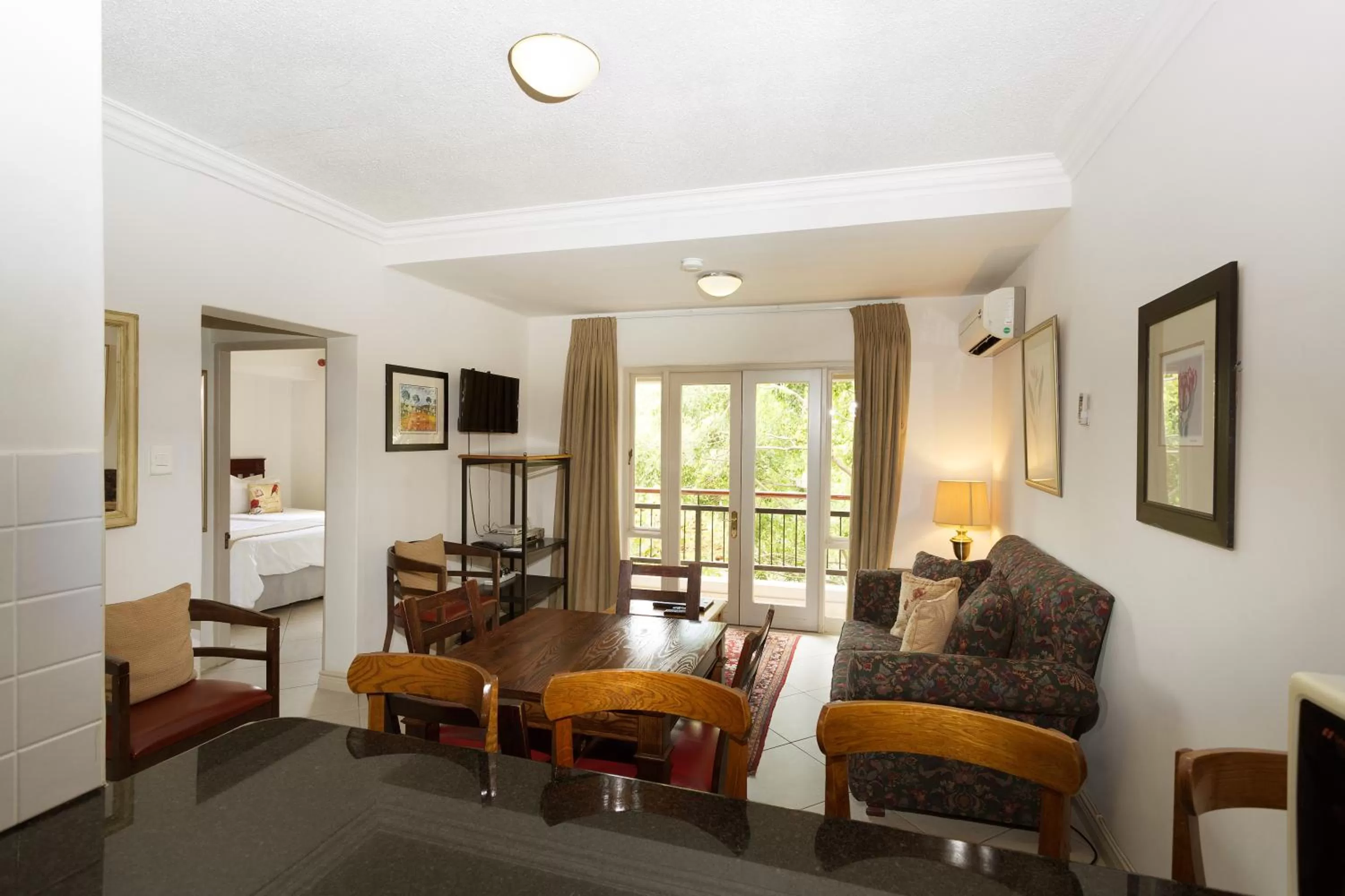 Seating area, Bed in The Stellenbosch Hotel