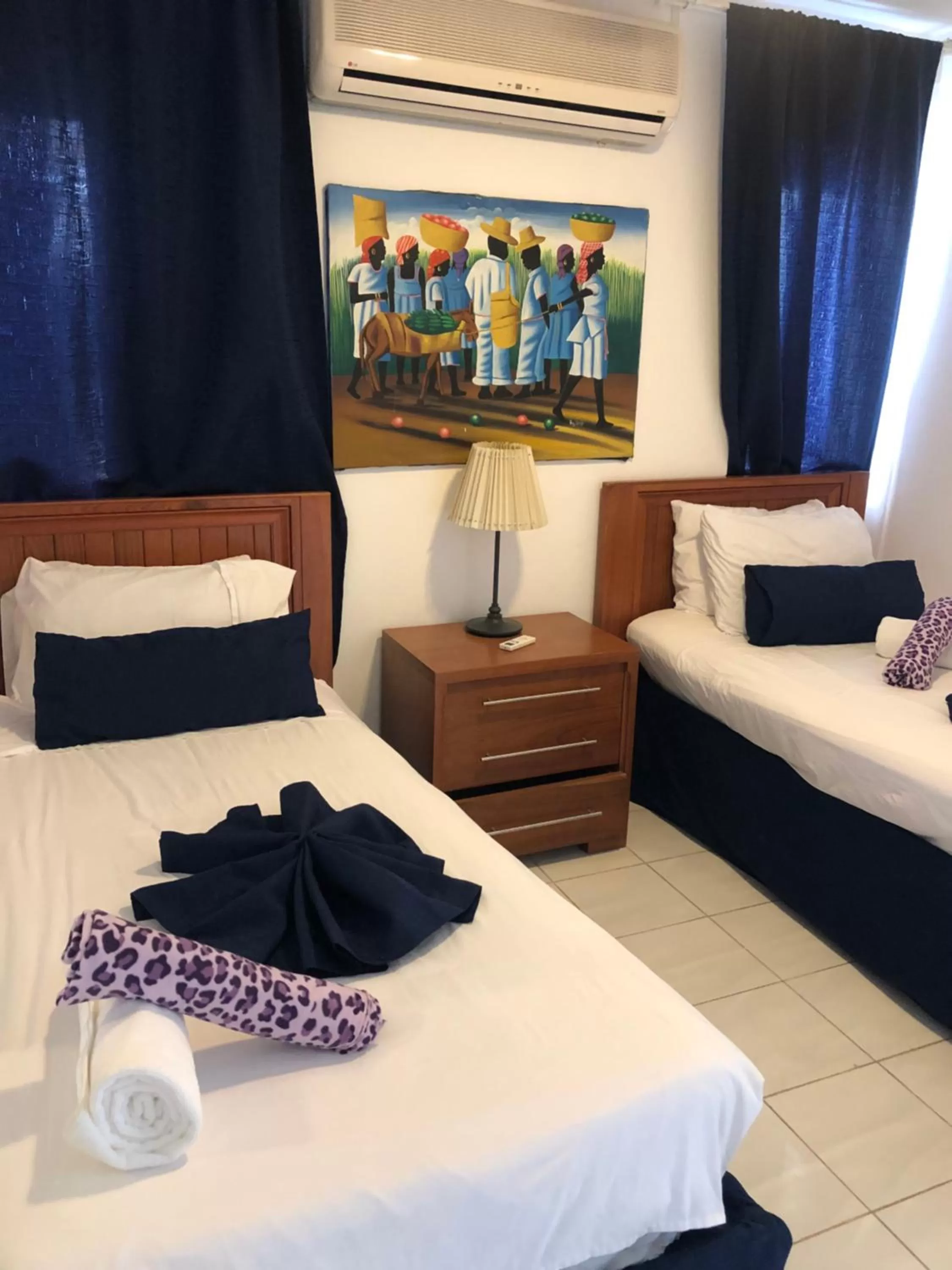 Bed in Los Corales Luxury Villas Beach Club and Spa