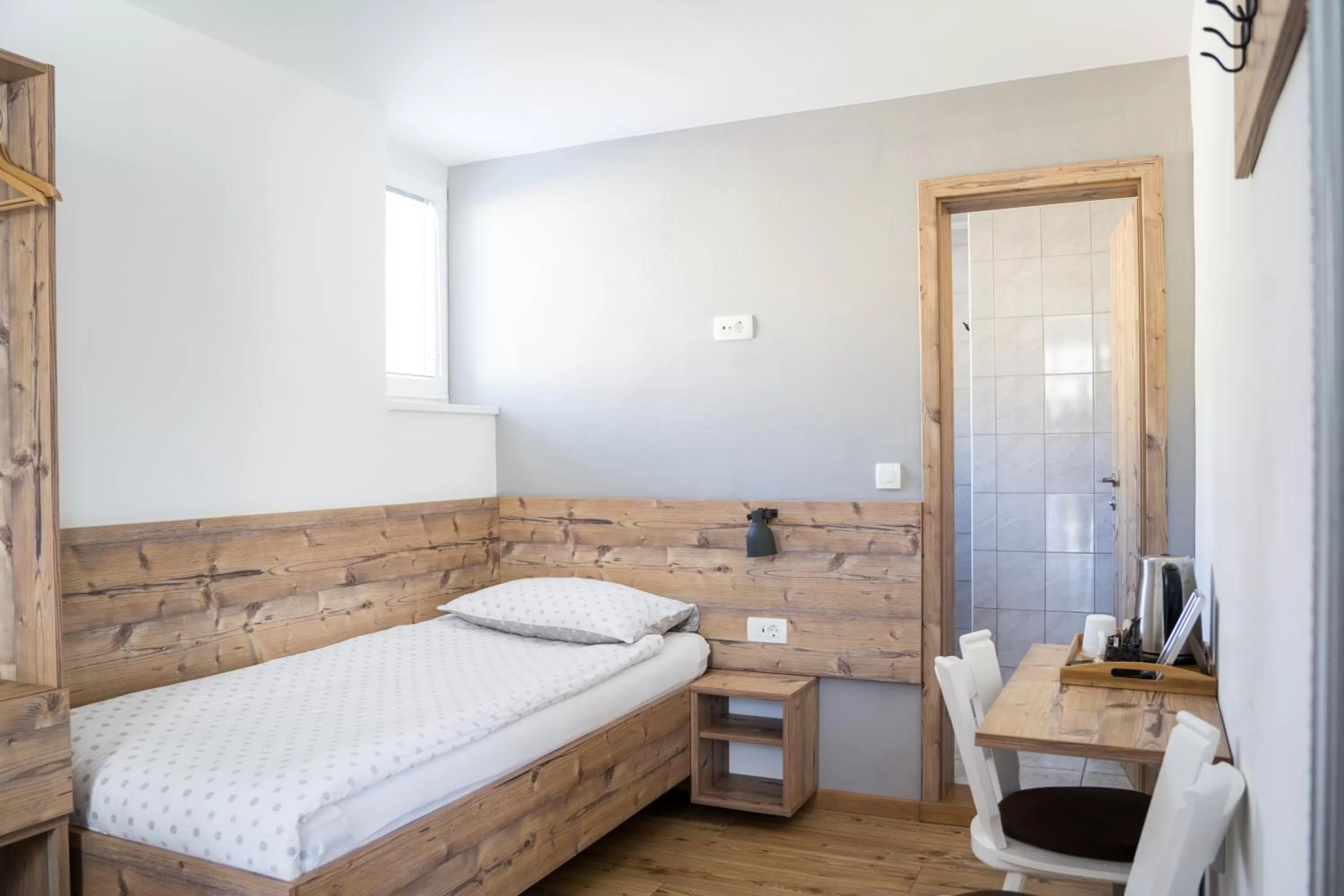 Bed in Hiša Poljana Rooms