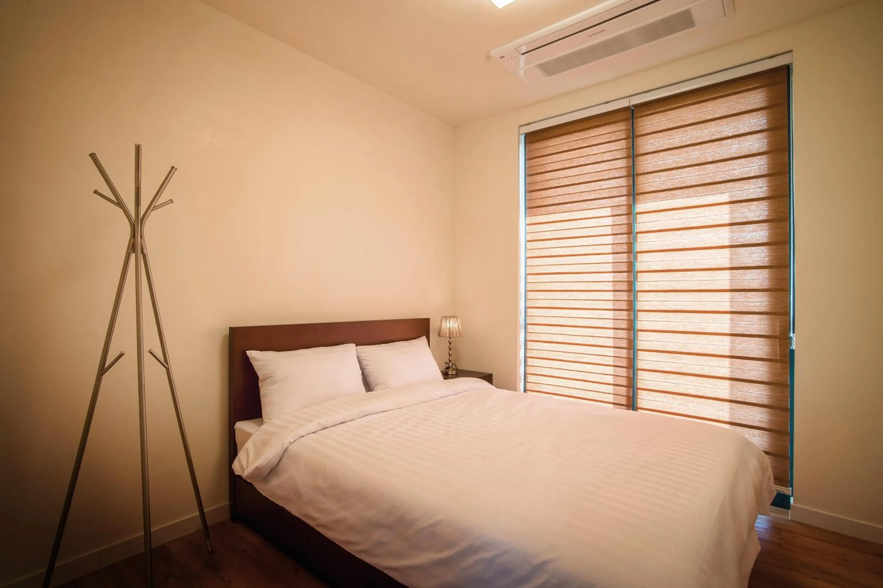 Bed in Poema Stay Pension