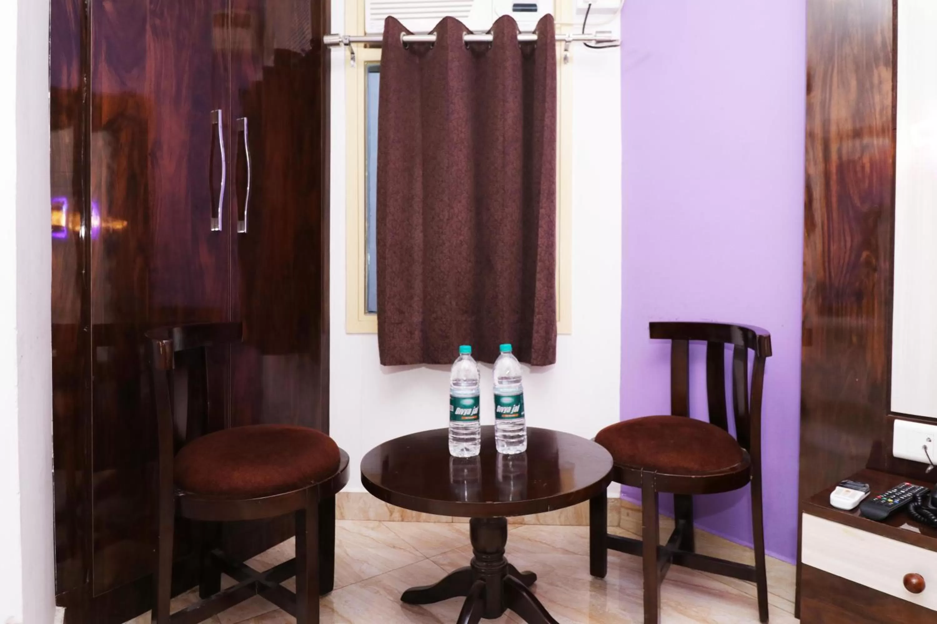 Seating area in Airport Hotel Shivaka Inn