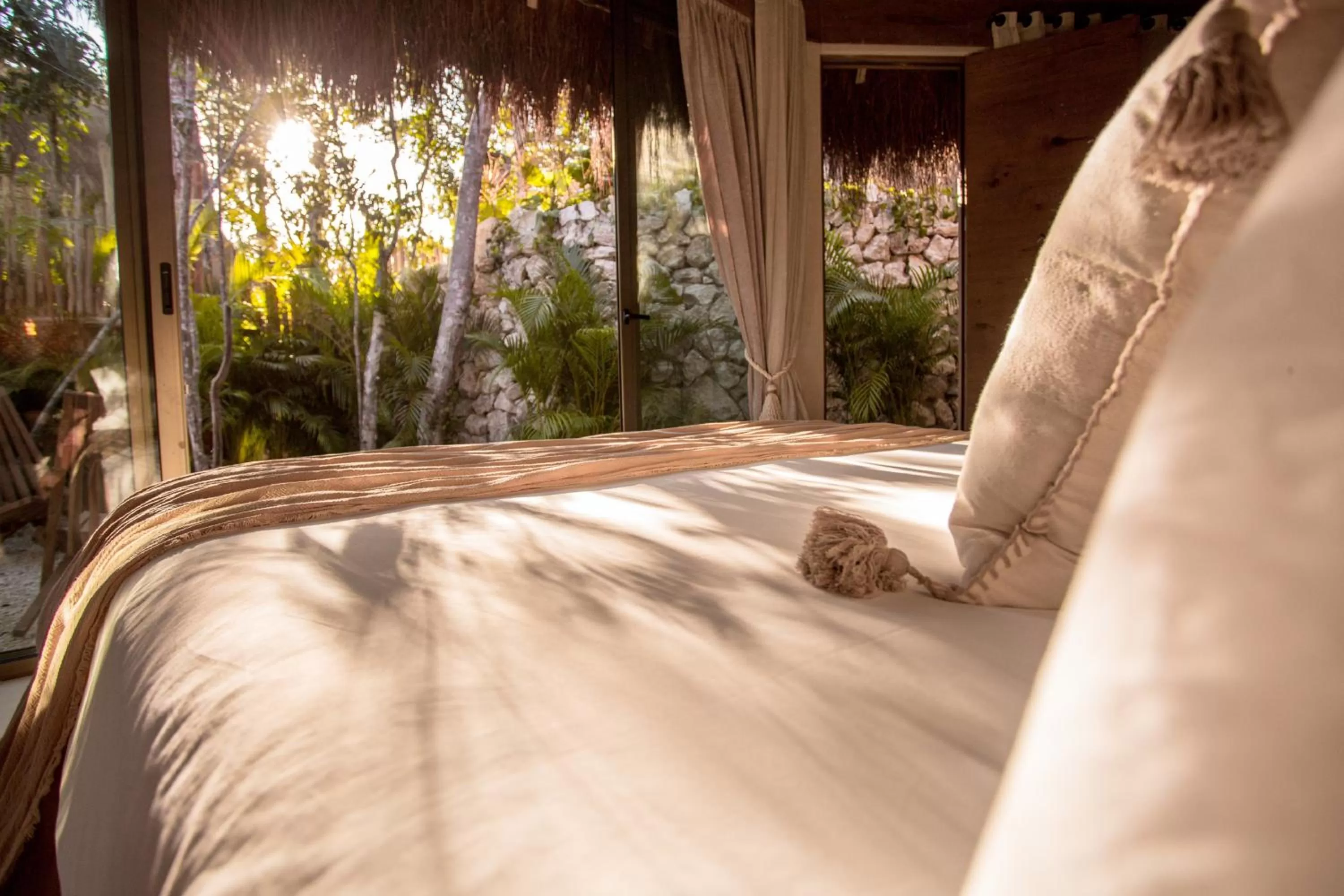 Bed in Hotel Muaré Tulum Wellness and Spa