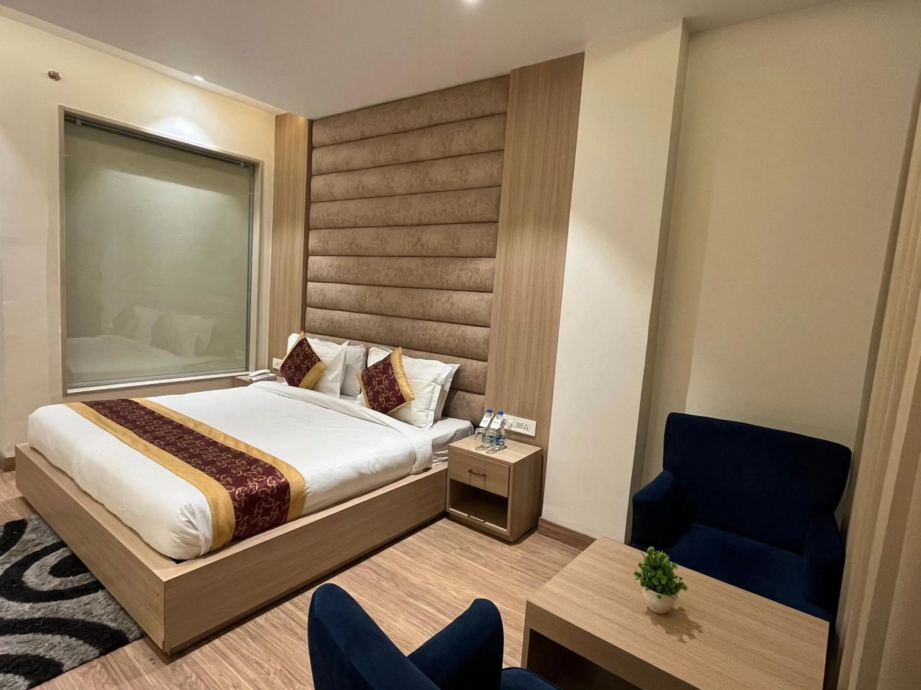 Photo of the whole room, Bed in RRV Hotel