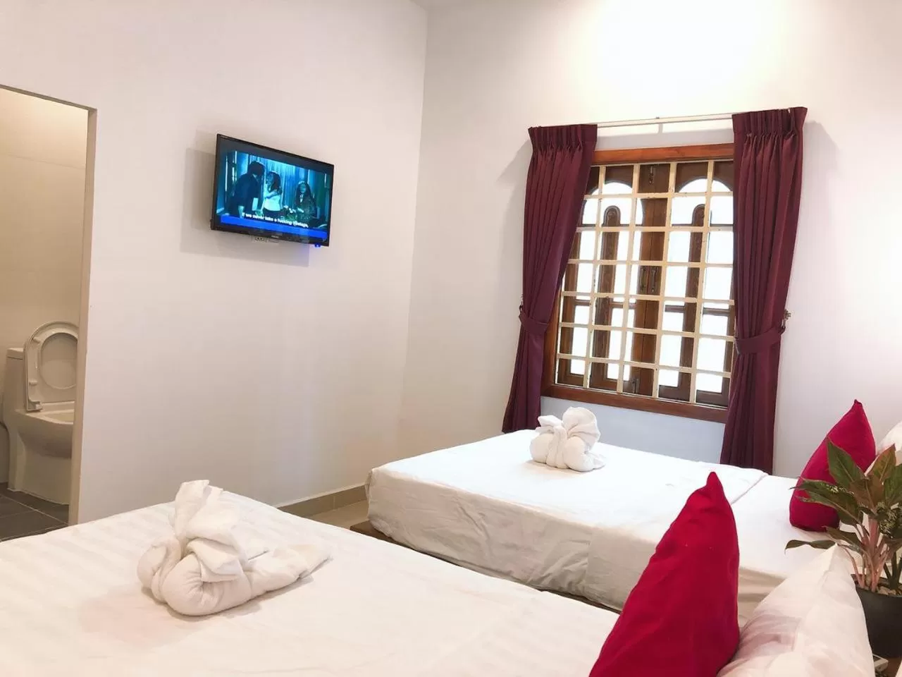 Bed in Poolside Villa