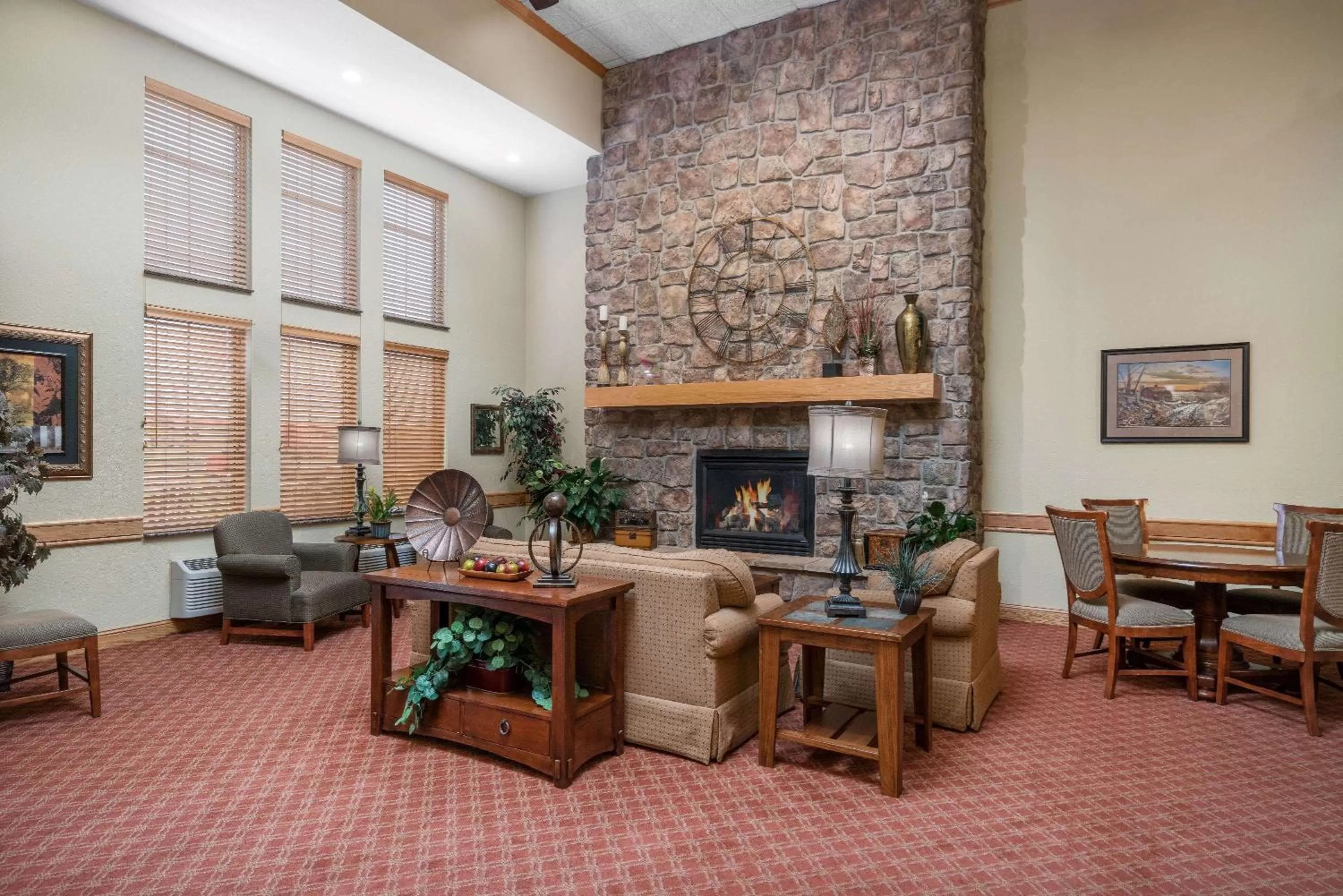 Seating area in AmericInn by Wyndham Newton