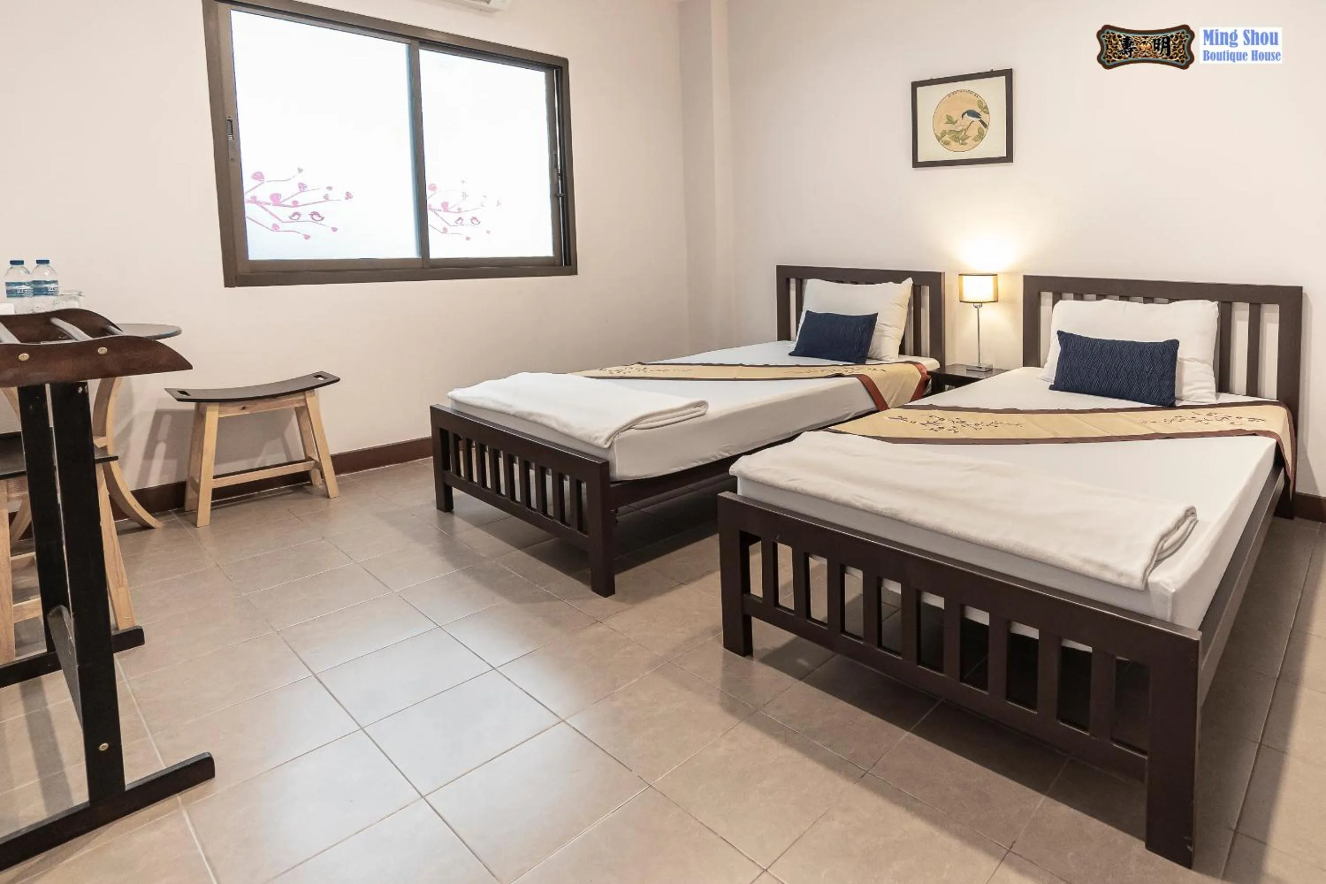 Photo of the whole room, Bed in Ming Shou Boutique House