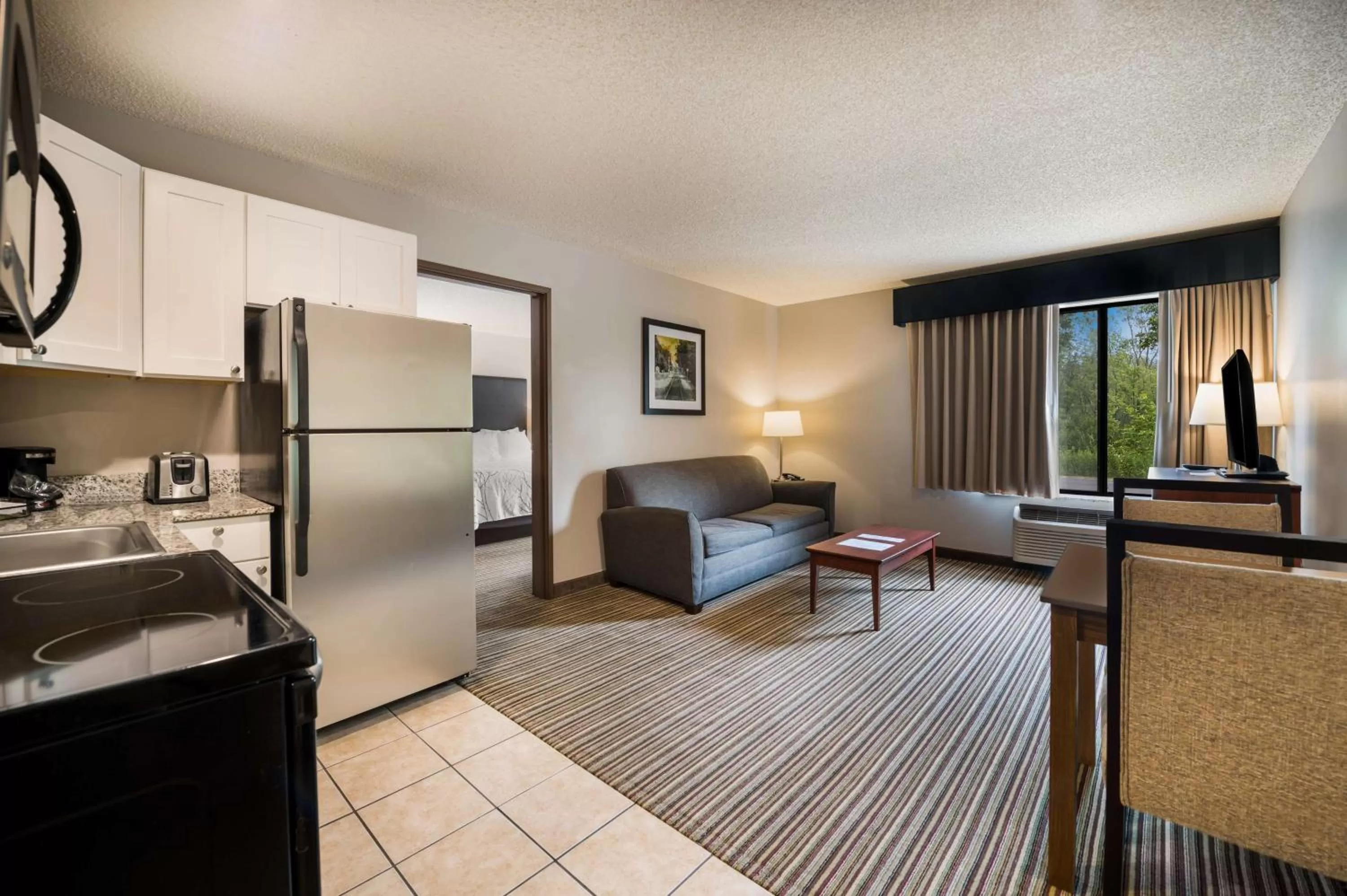 Bedroom in Best Western Park Oasis Inn