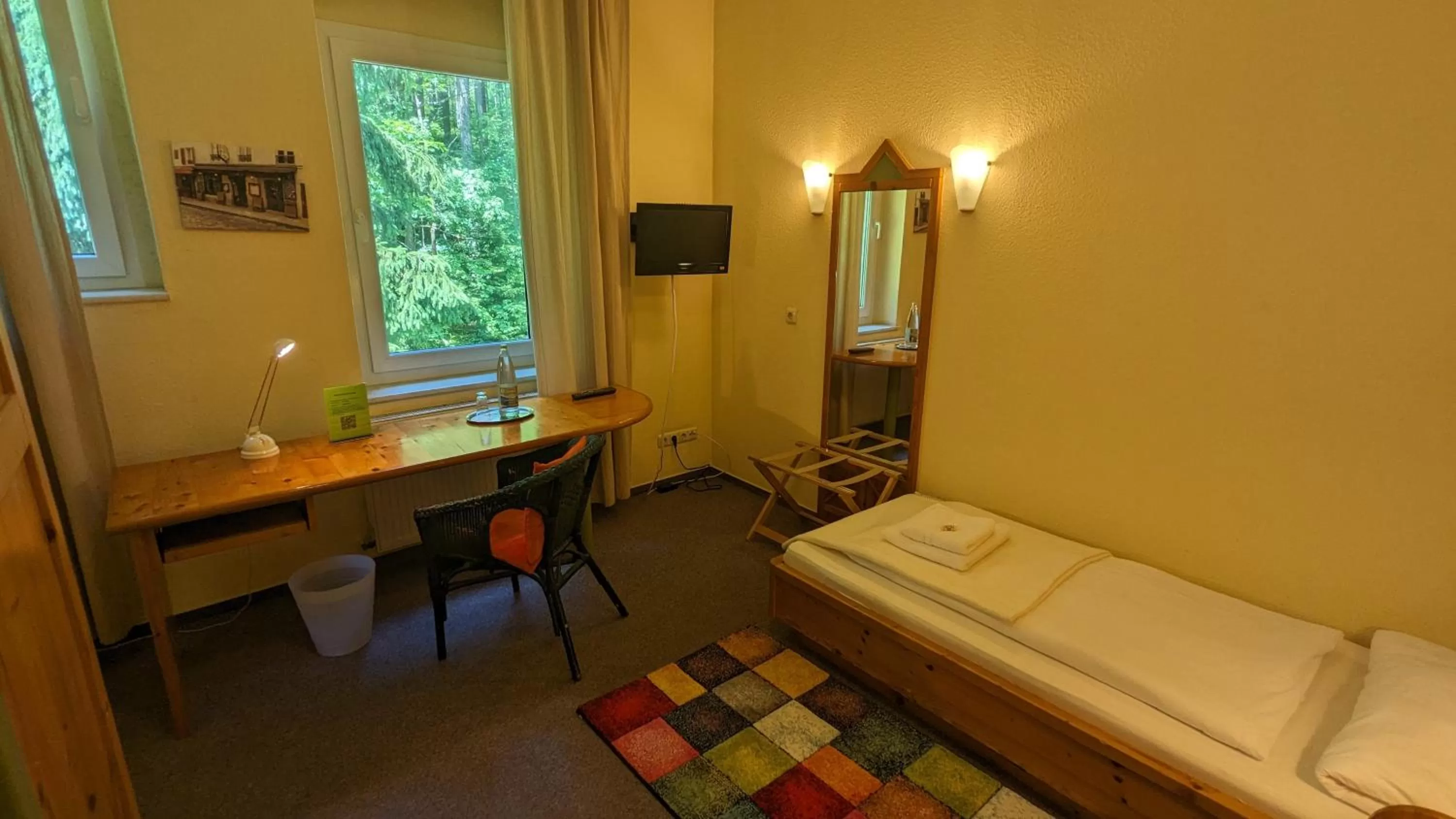 Photo of the whole room, Bed in Naturhotel Forsthaus