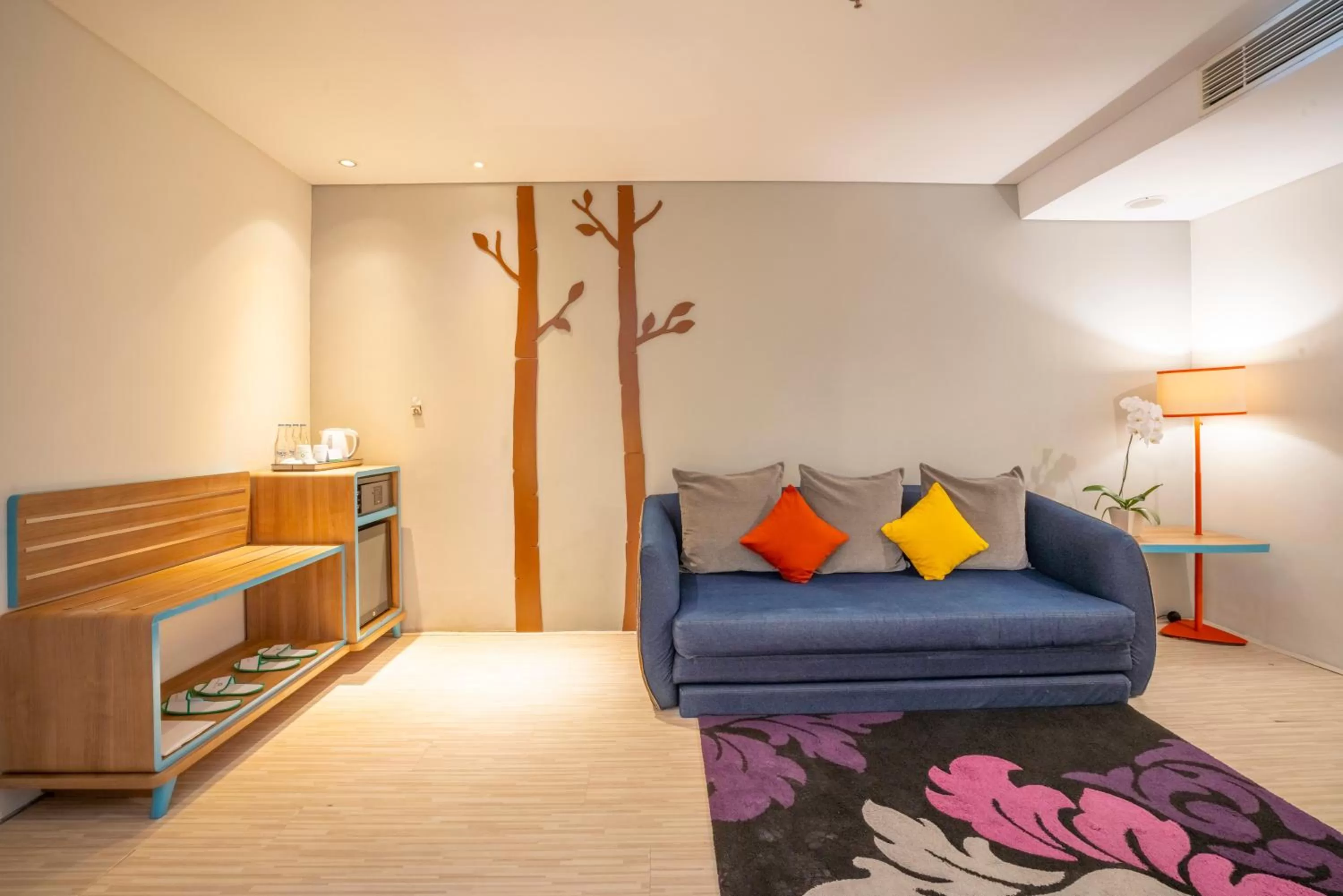 Living room, Bed in Grand Livio Kuta Hotel