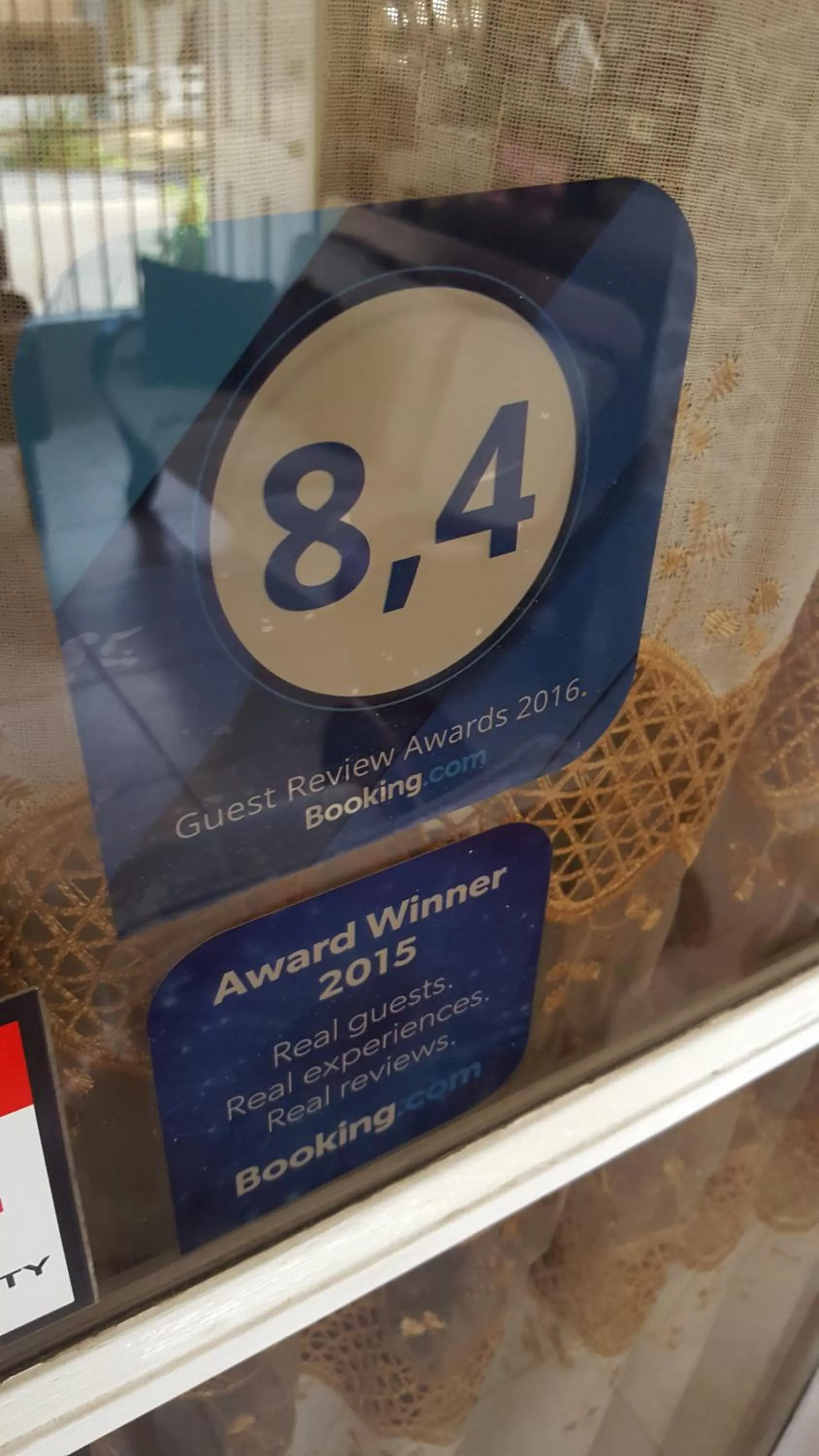 Logo/Certificate/Sign in A1 Apartments Aruba