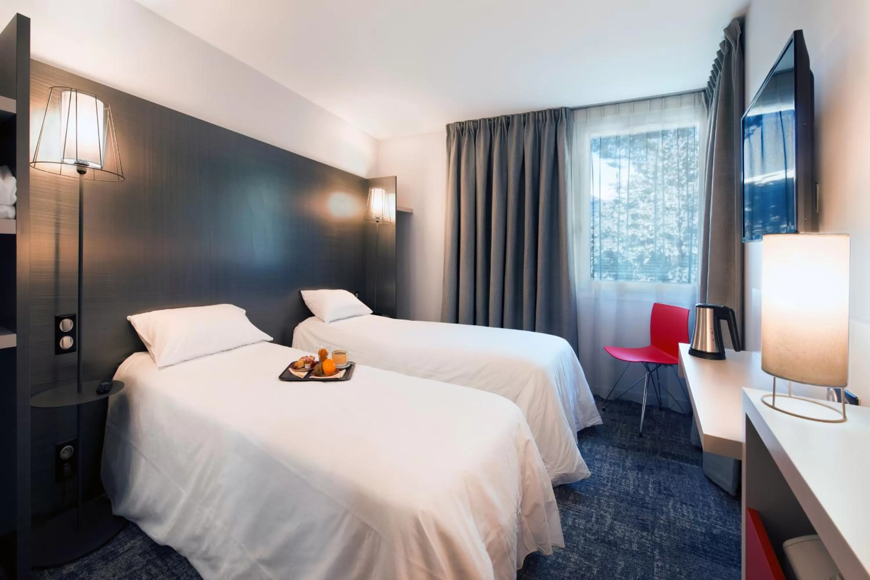 Bed in L'hôtel by JOA de Saint-Paul-Lès-Dax