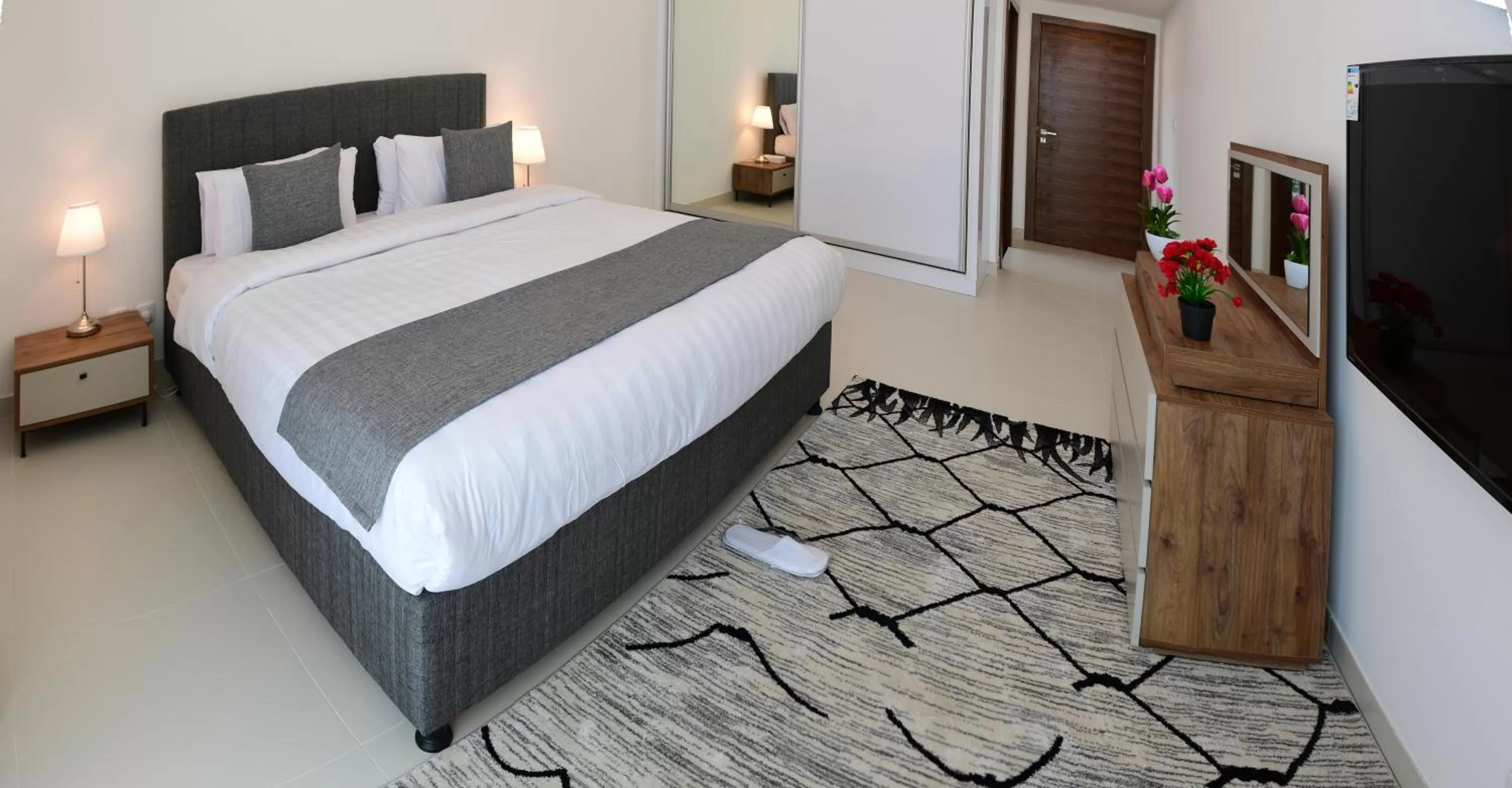 Bed in Noor Amwaj Hotel & Apartment