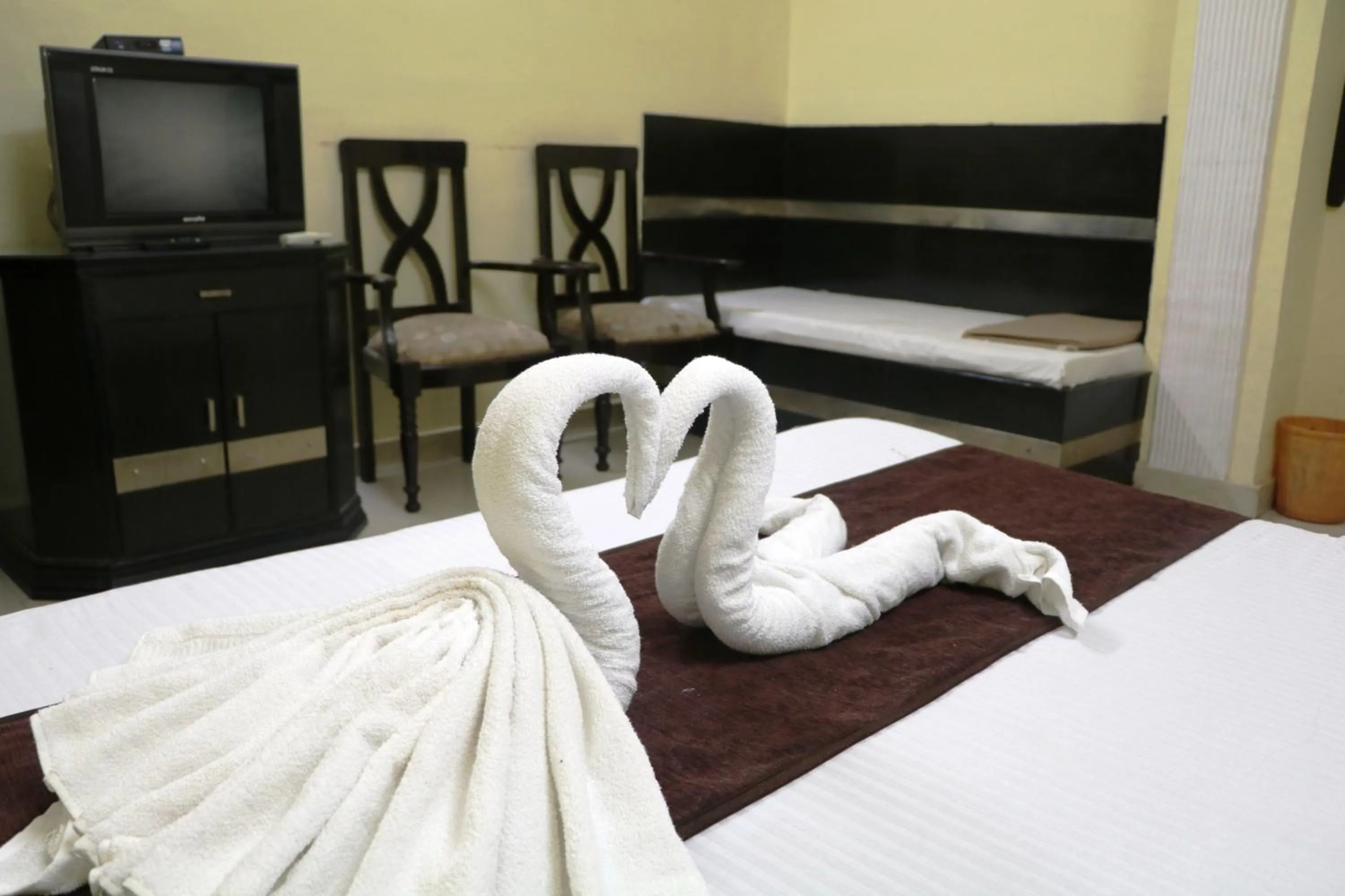 Bed in Hotel Vaishnavi