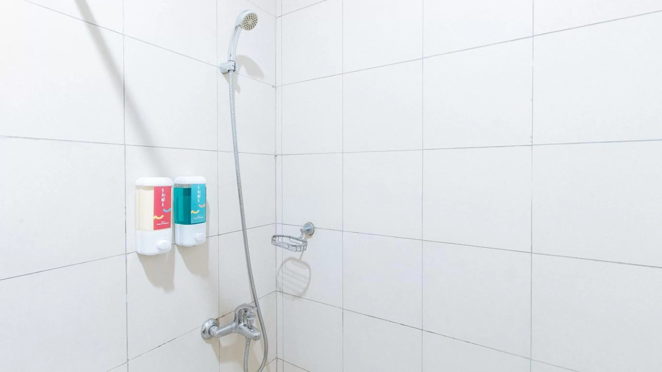 Shower in Sans Hotel Laperal Manila