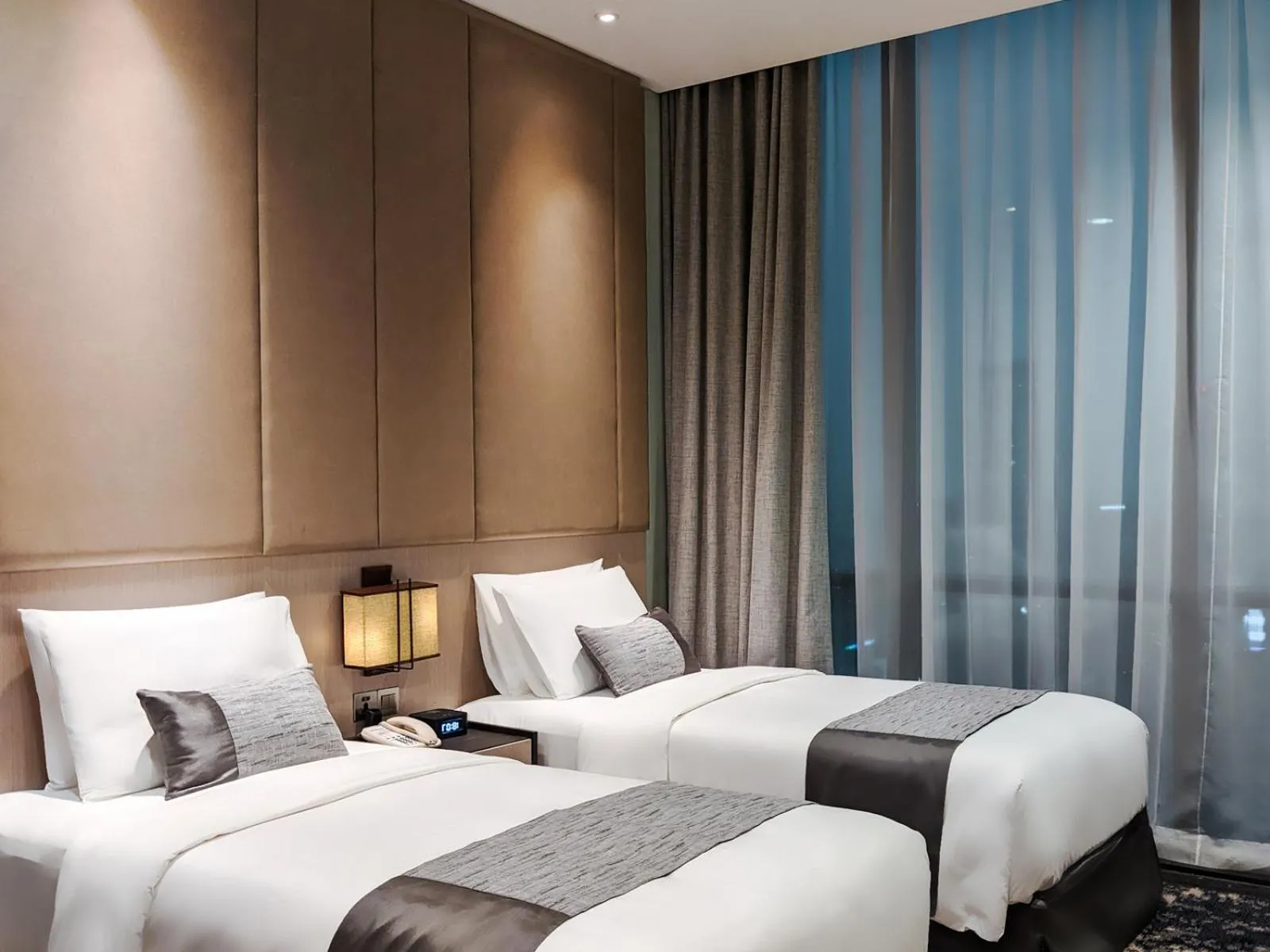 Bedroom, Bed in Crowne Plaza Jakarta Residences, an IHG Hotel