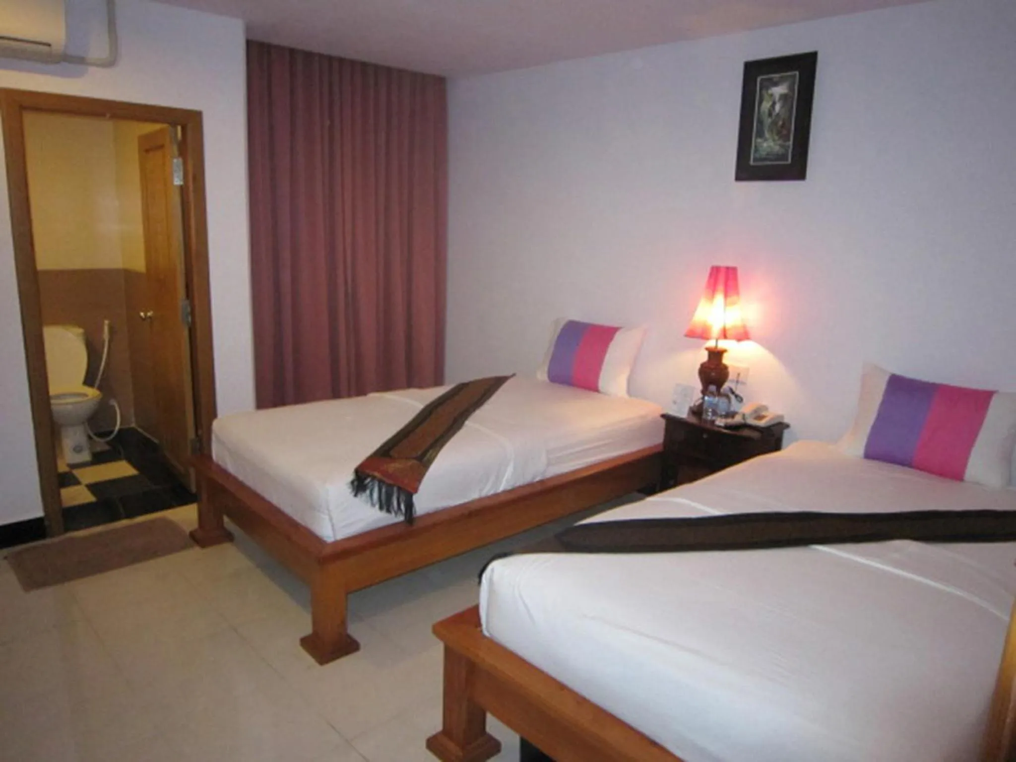 Bed in Star Wood Inn