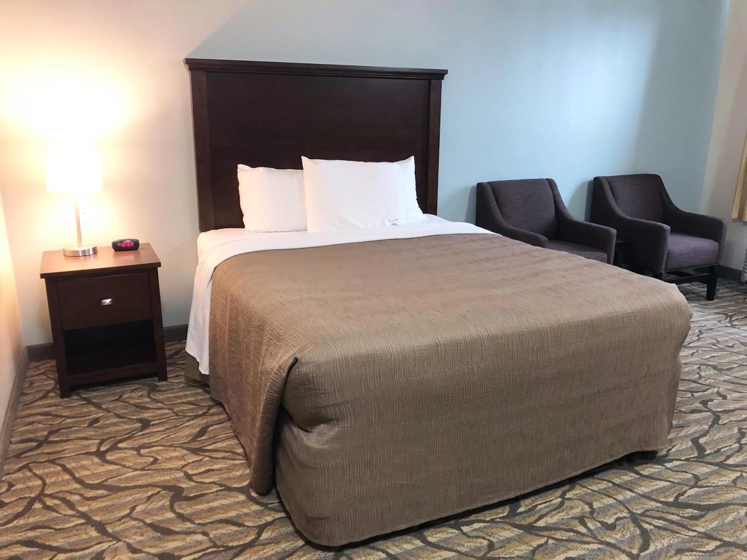 Bed in Aptel Studio Hotel