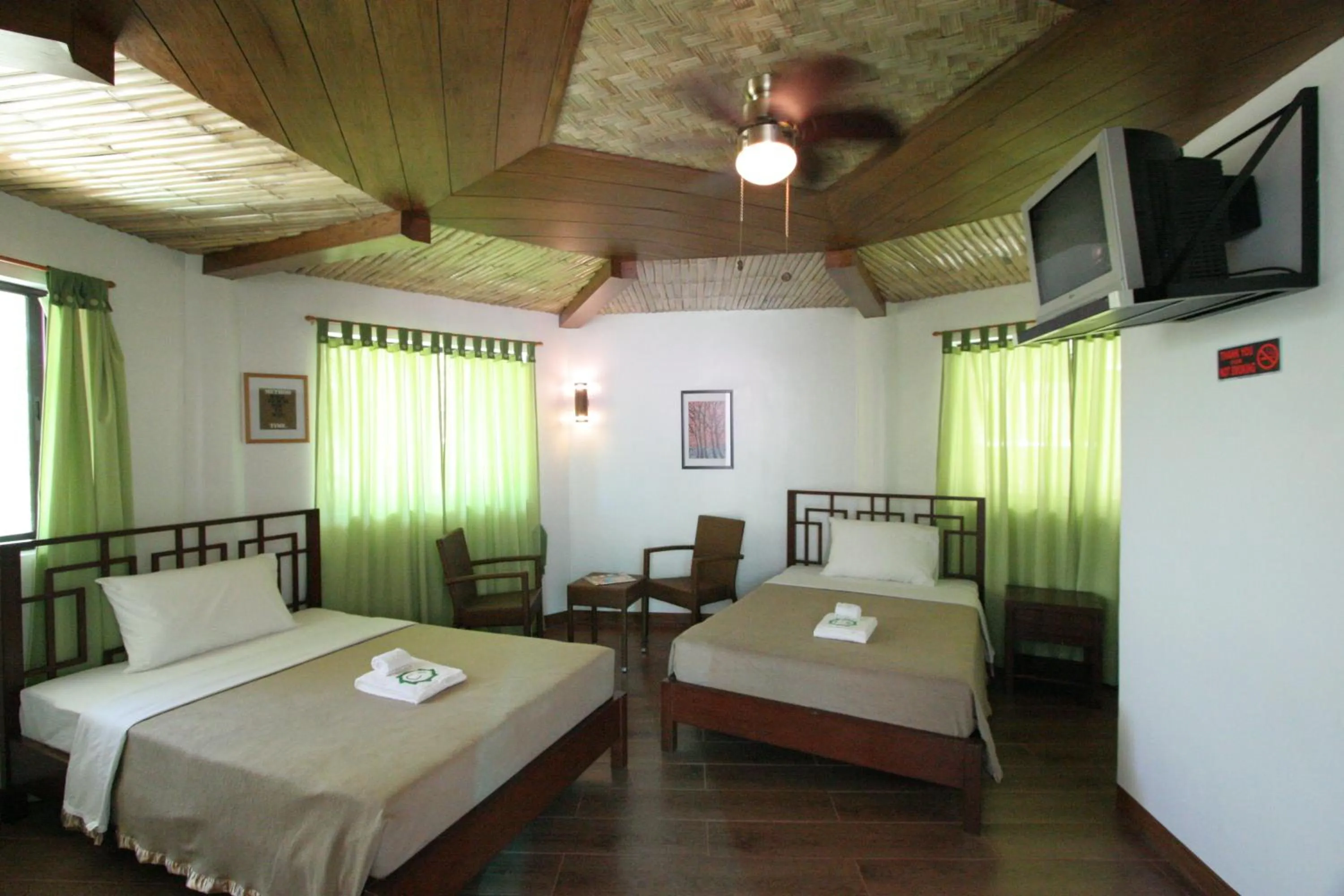 Bed in Coron Hilltop View Resort