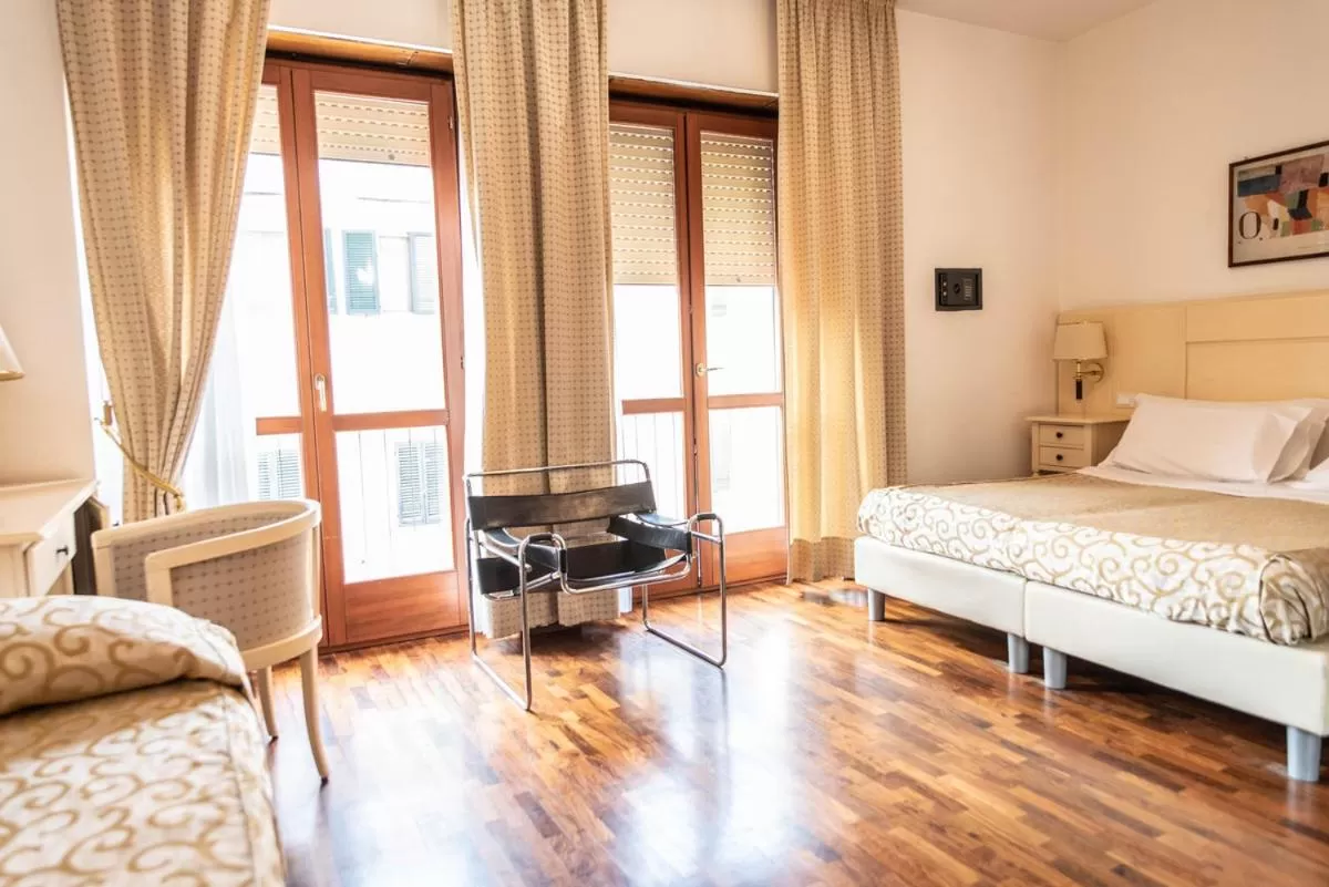 Photo of the whole room, Bed in Grand Hotel Duomo