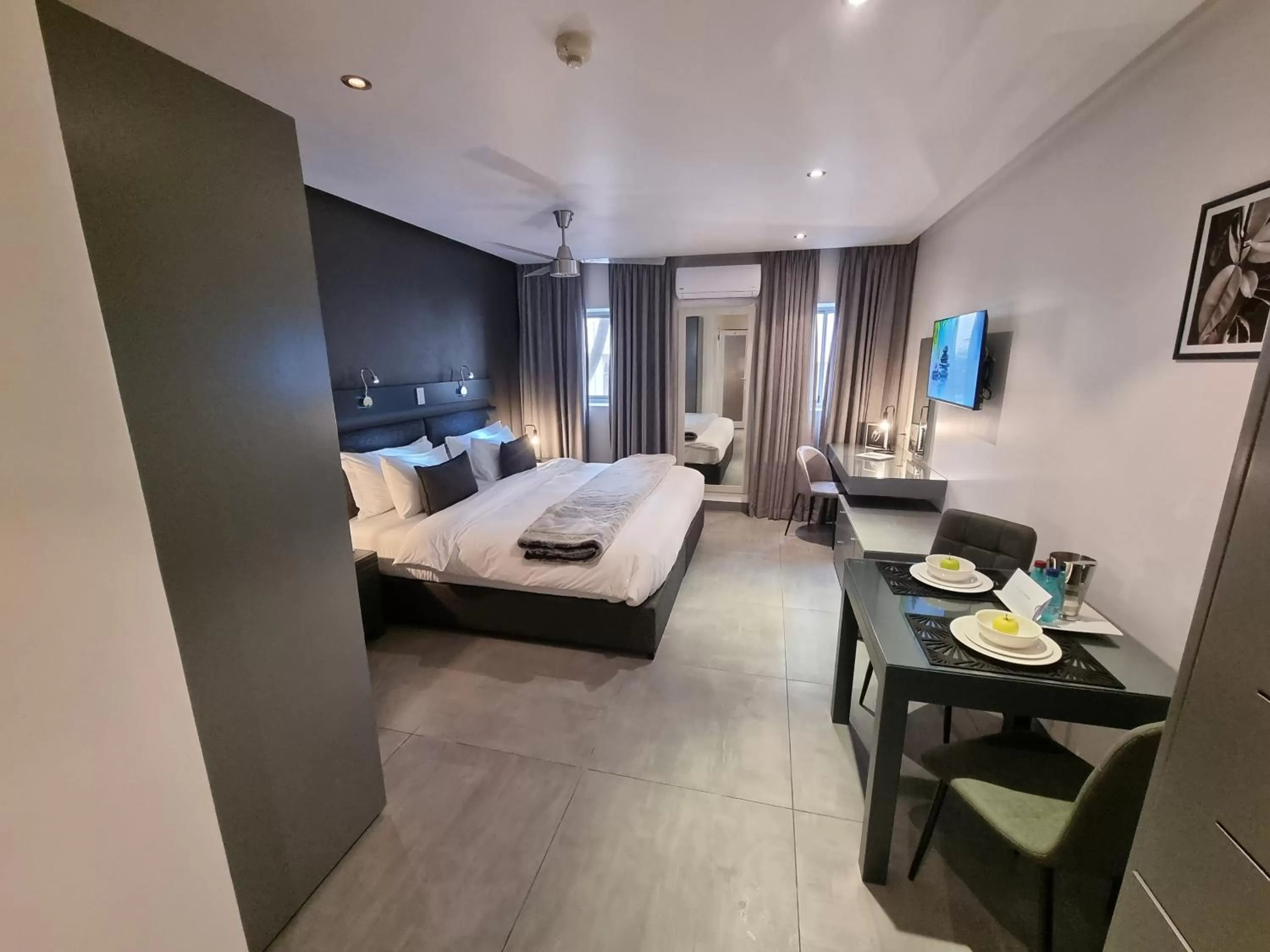 Bed in Atlantic Affair Boutique Hotel