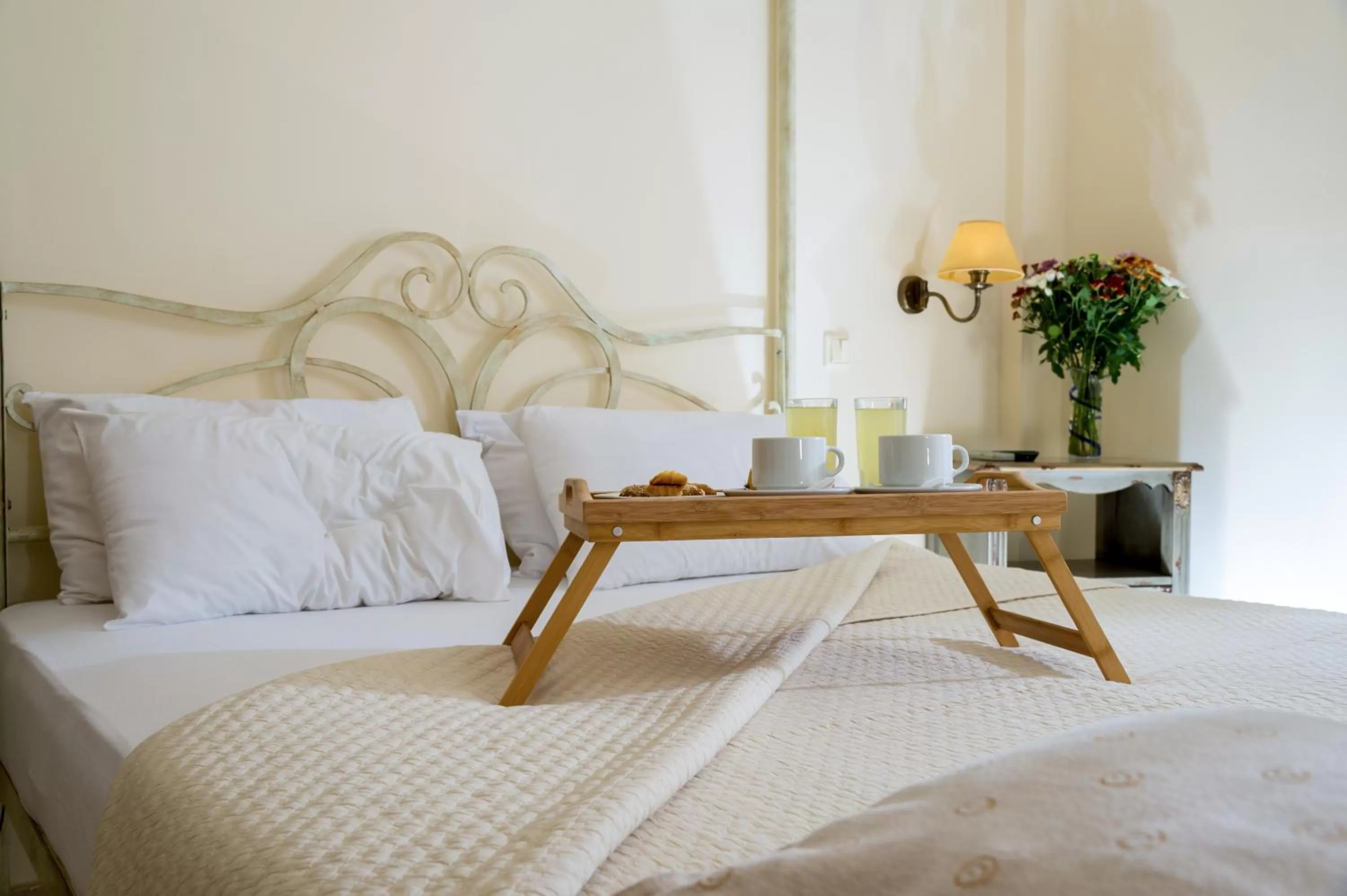 Bed in Ikaros Art Hotel