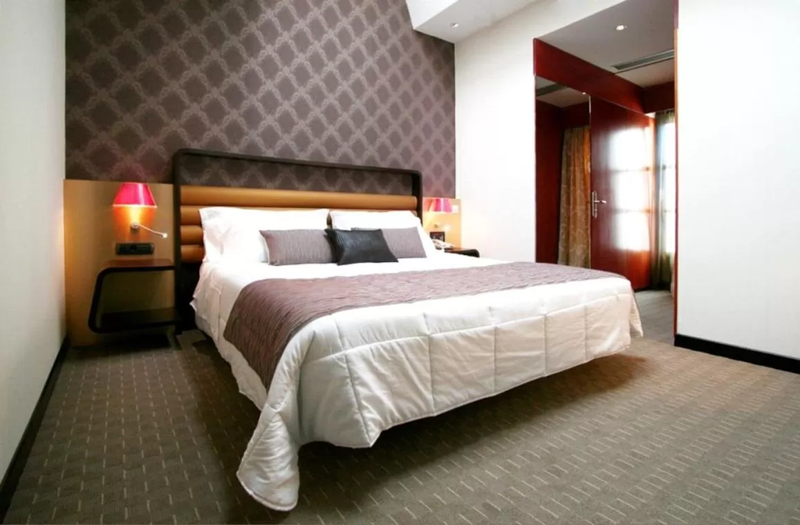 Photo of the whole room, Bed in Sure Hotel by Best Western Turin City Centre