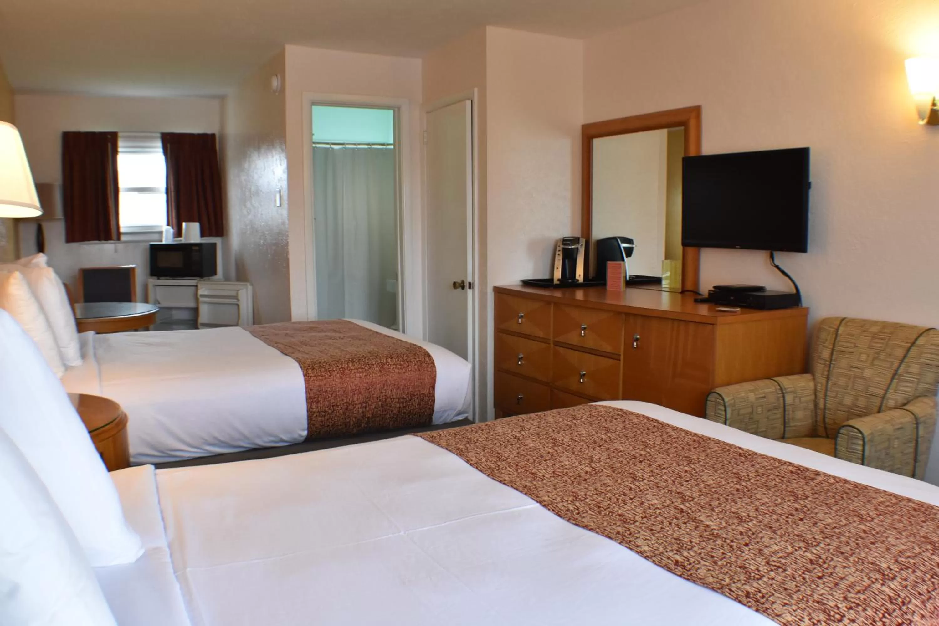 Bed in Blue Water Motel